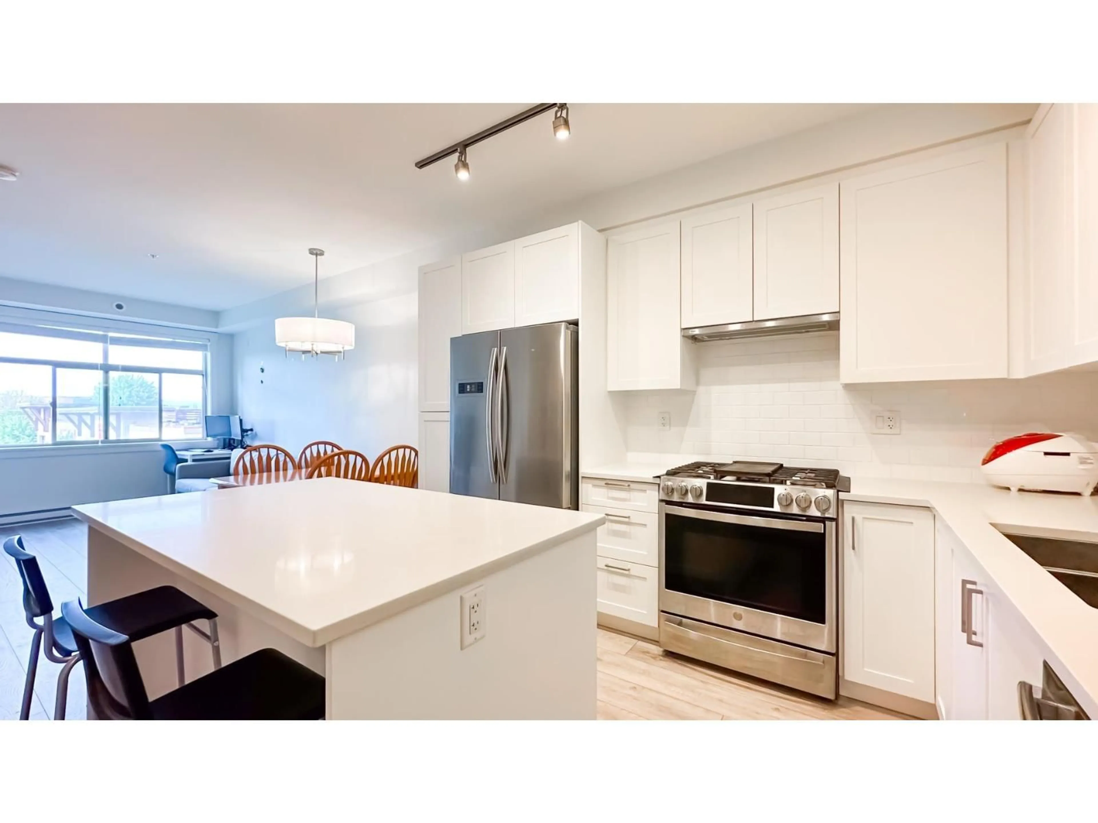 Open concept kitchen, unknown for 317 - 20673 78, Langley British Columbia V2Y3K1