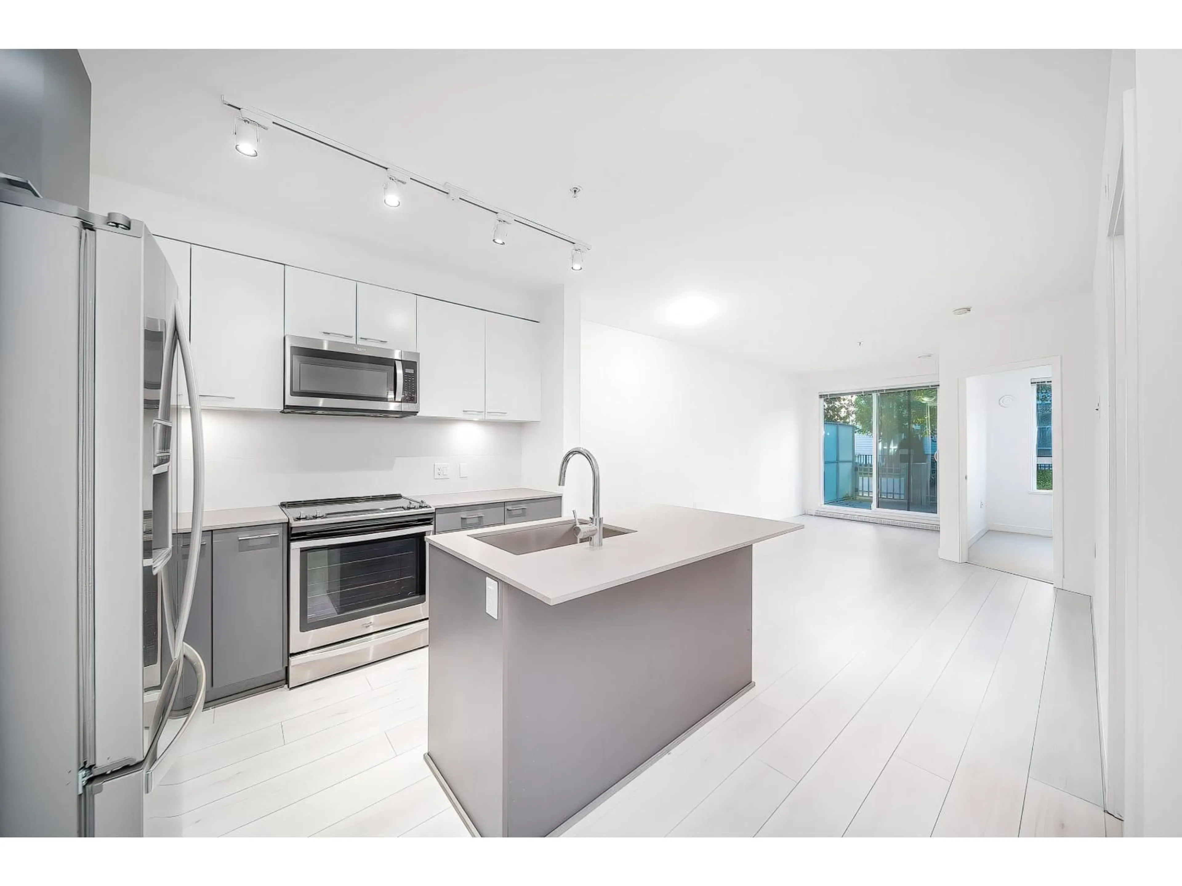 Open concept kitchen, unknown for 121 - 13963 105, Surrey British Columbia V3T0M9