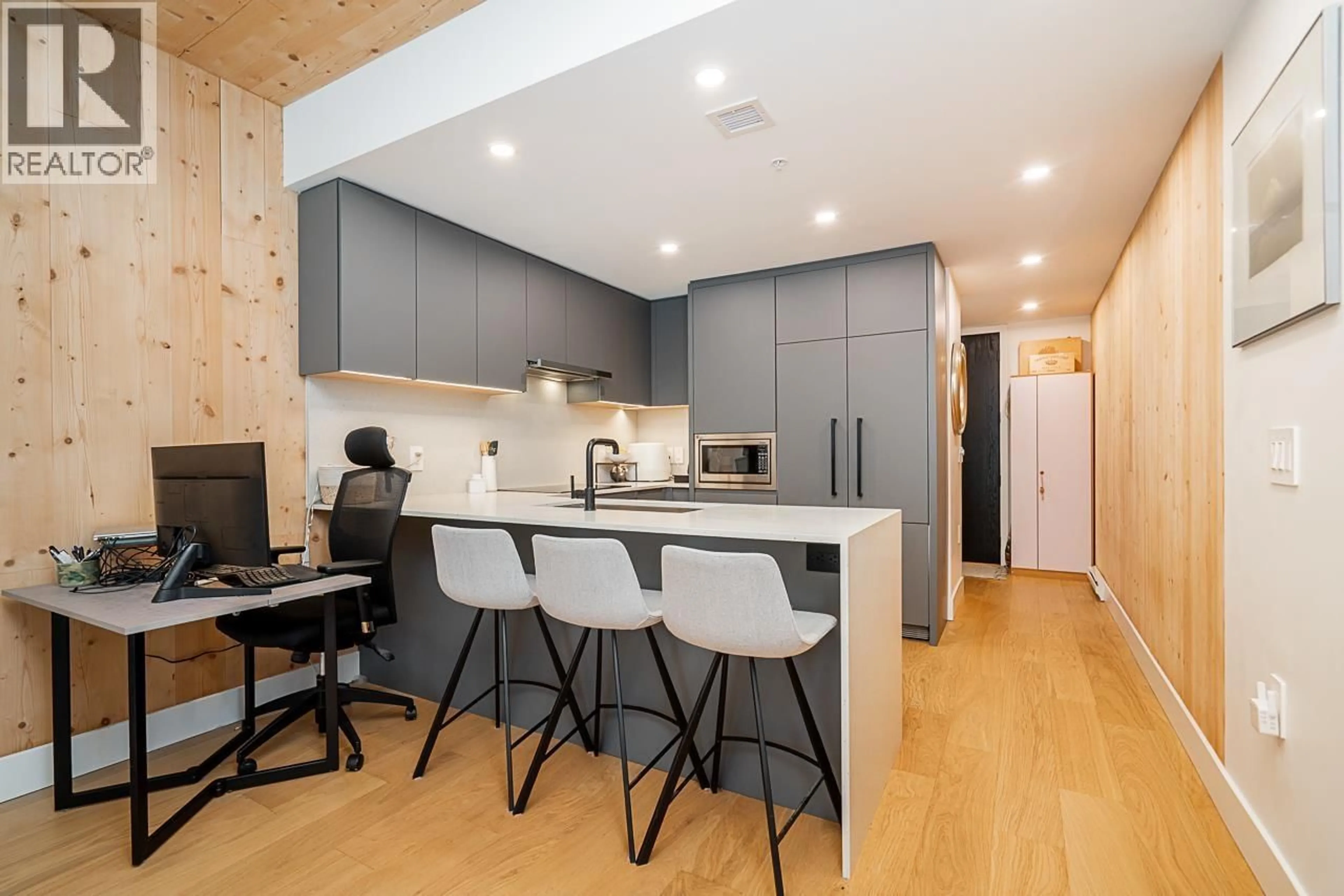 Open concept kitchen, wood/laminate floor for 202 - 310 SALTER STREET, New Westminster British Columbia V3M0N7