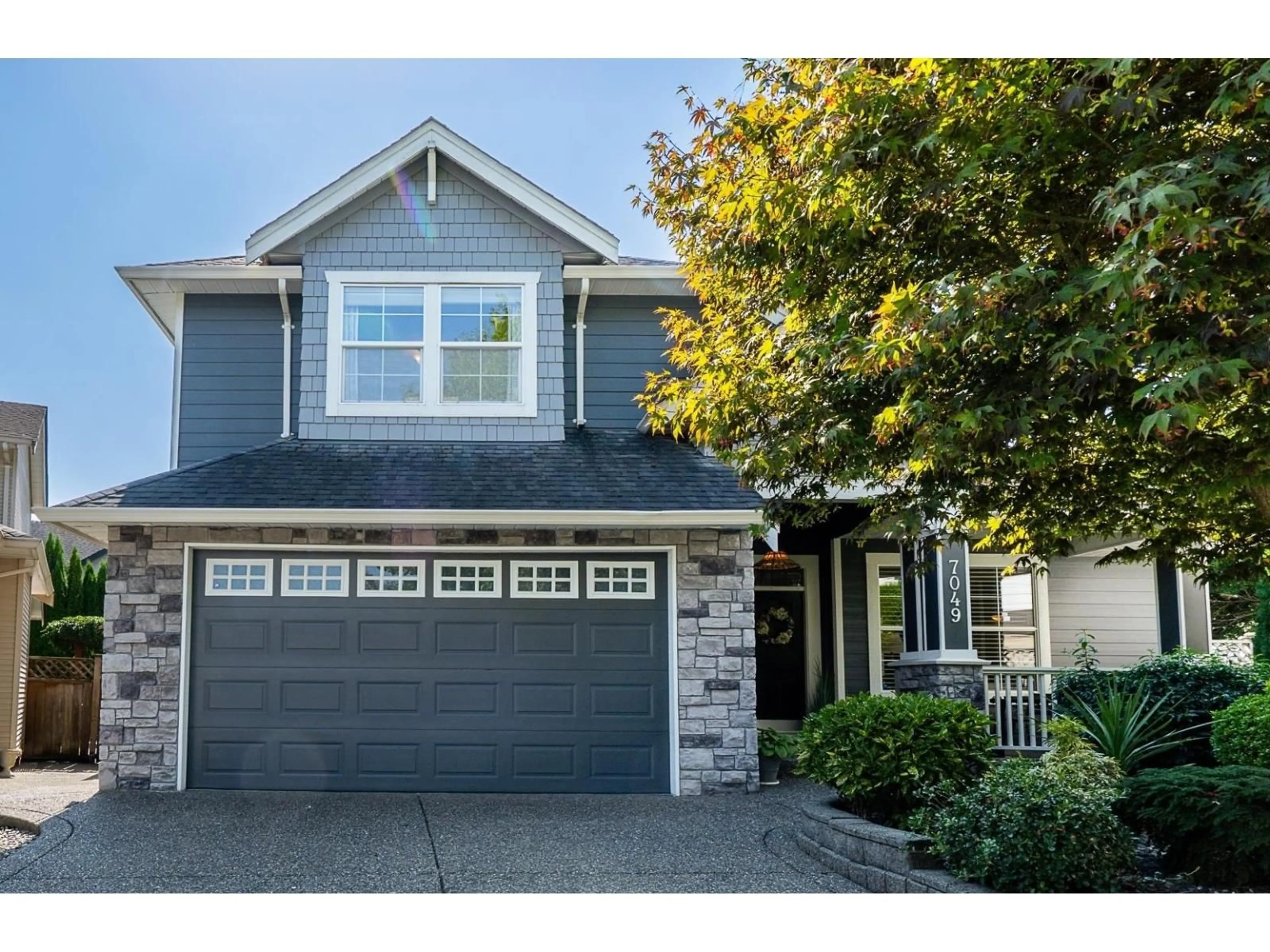 Home with vinyl exterior material, street for 7049 196A ST, Langley British Columbia V2Y2Z9