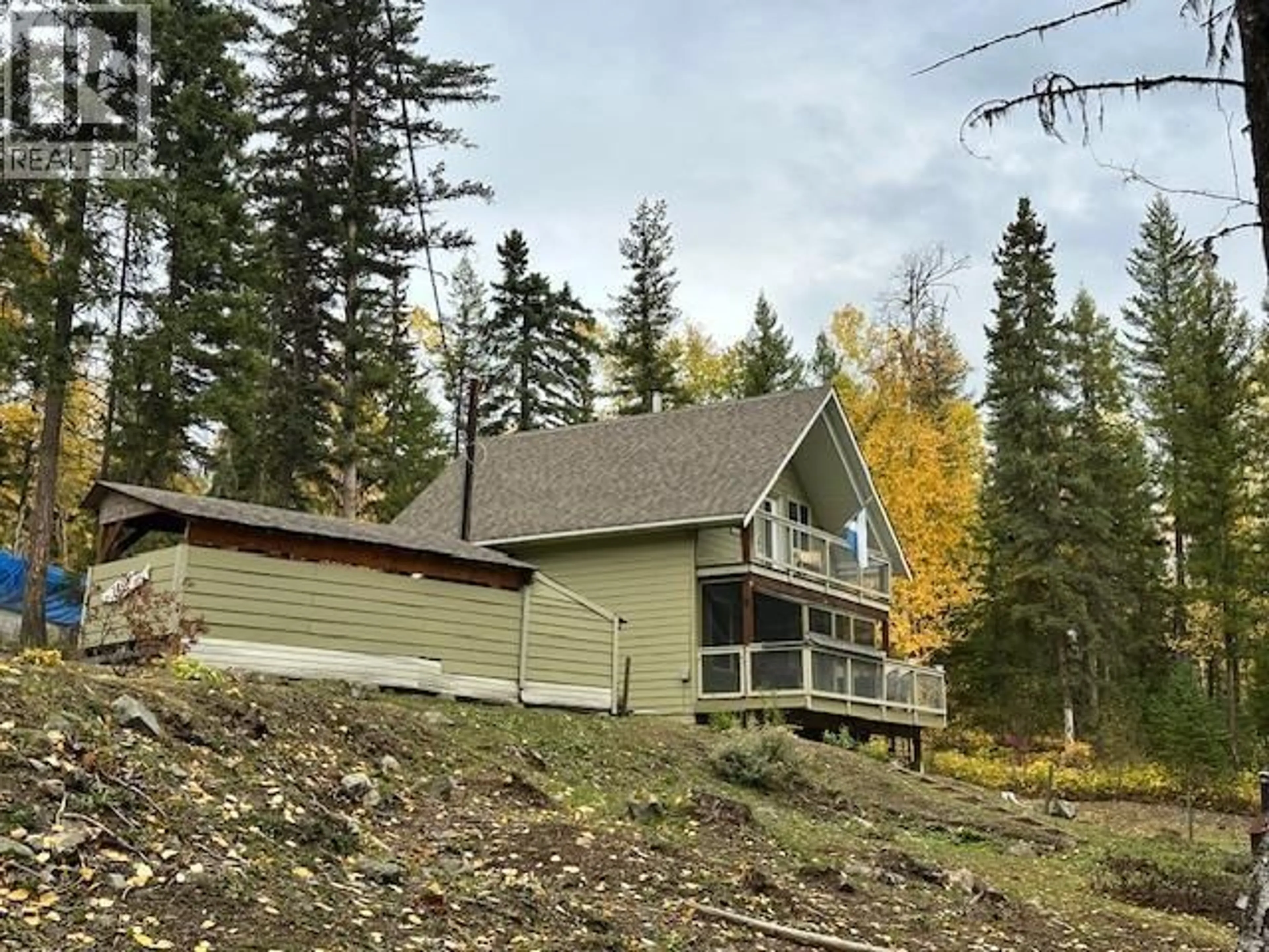 A pic from outside/outdoor area/front of a property/back of a property/a pic from drone, forest/trees view for 3557 CANDLE DRIVE, Canim Lake British Columbia V0K1L0
