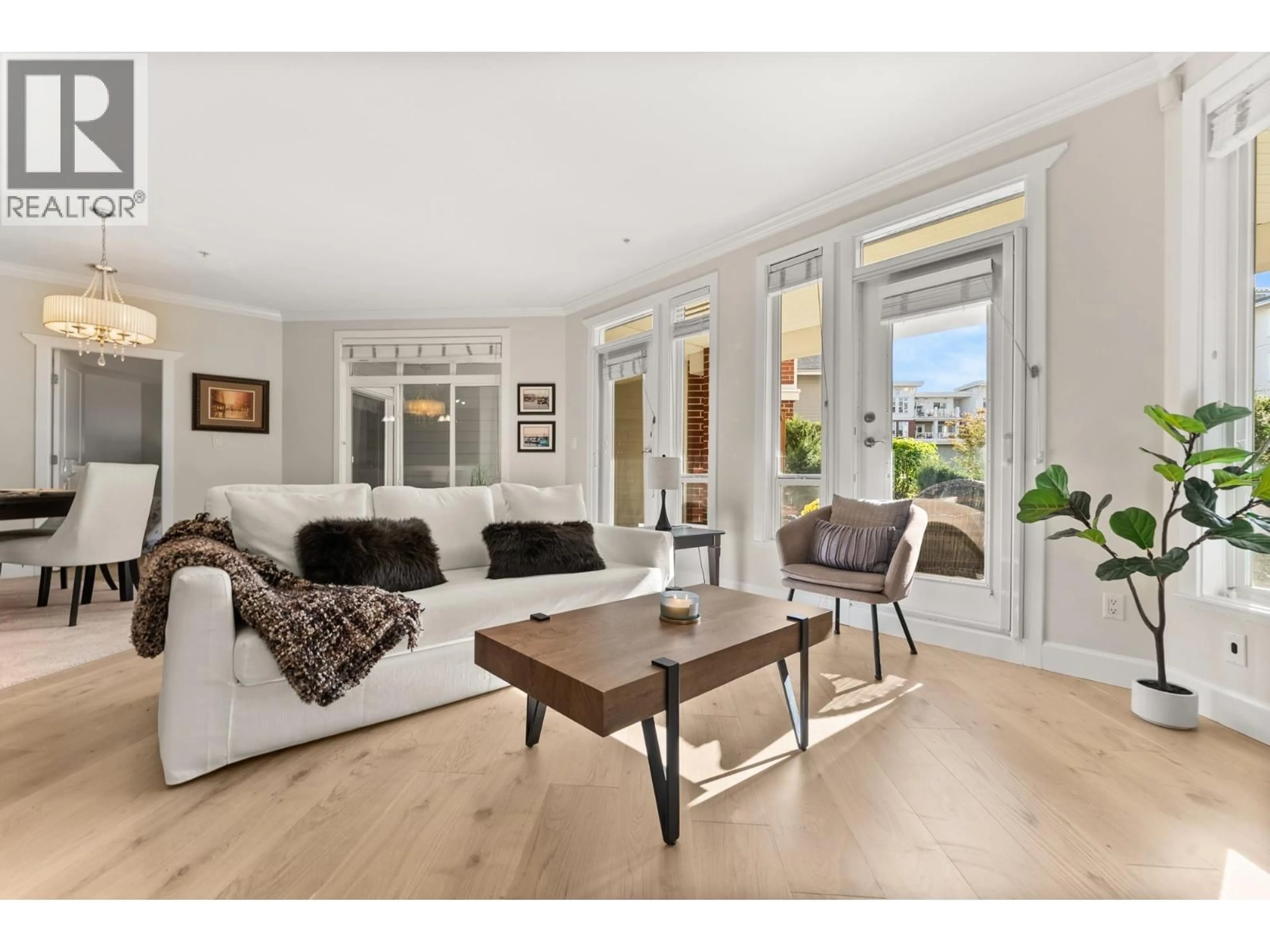 Living room with furniture, unknown for 102 - 4280 MONCTON STREET, Richmond British Columbia V7E6T4