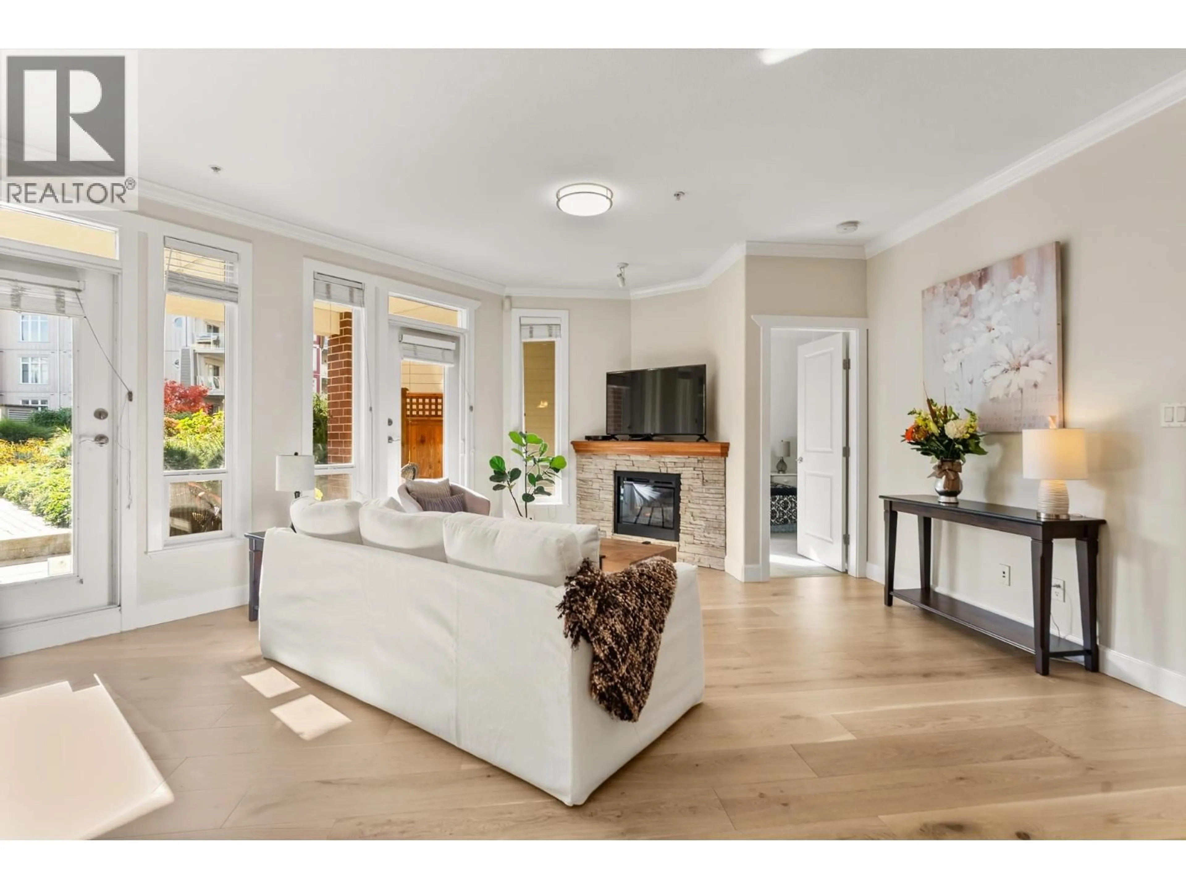 Living room with furniture, unknown for 102 - 4280 MONCTON STREET, Richmond British Columbia V7E6T4