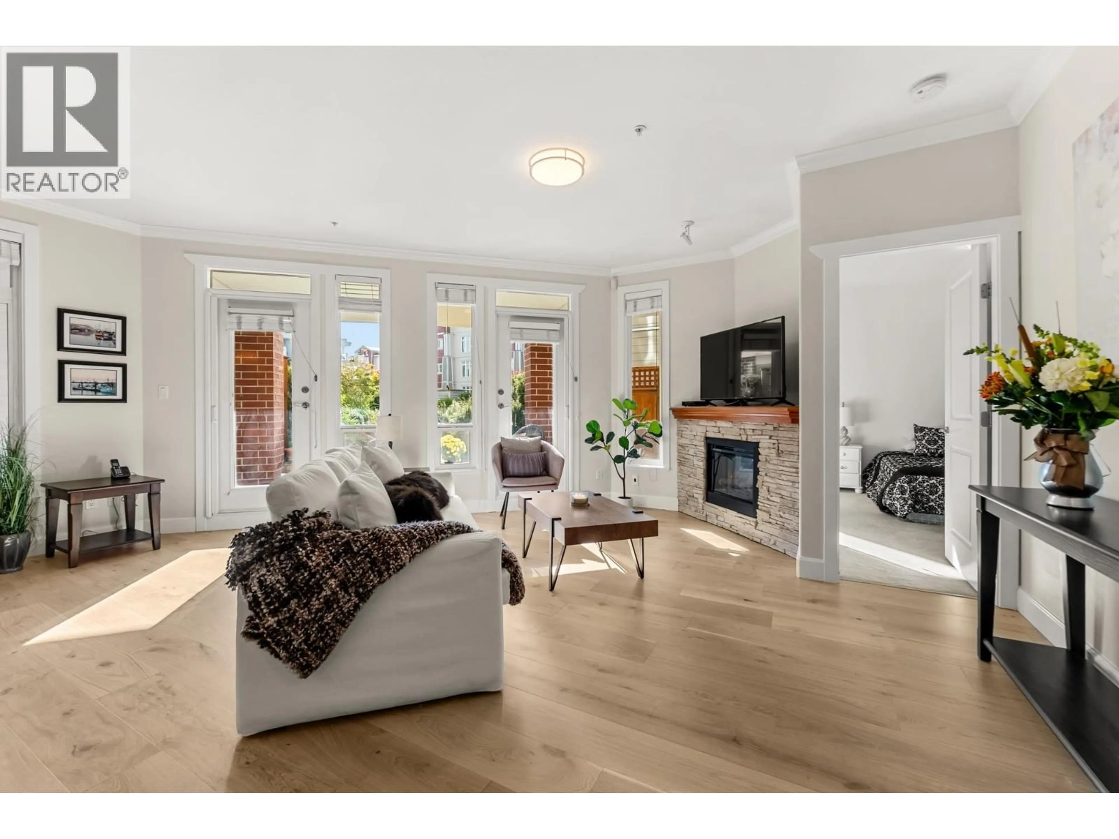 Living room with furniture, unknown for 102 - 4280 MONCTON STREET, Richmond British Columbia V7E6T4