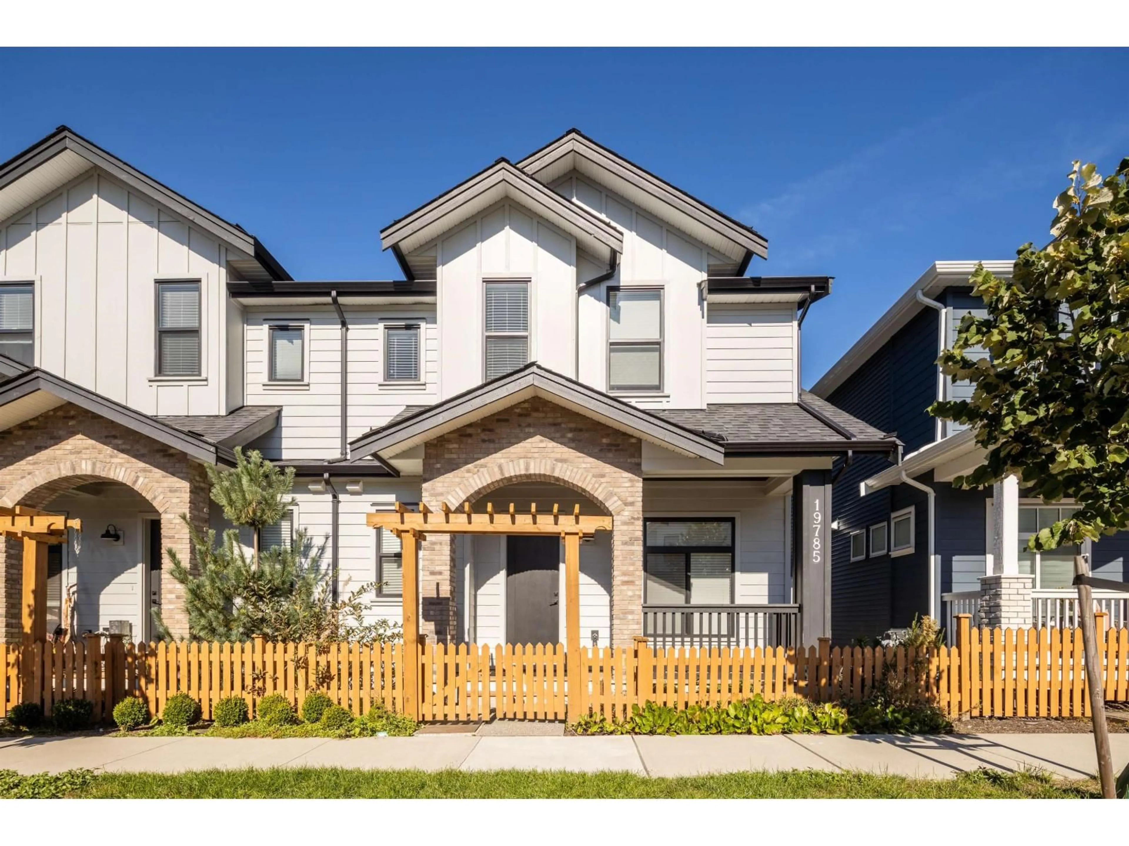 Home with vinyl exterior material, street for 19785 75A, Langley British Columbia V2Y5K2