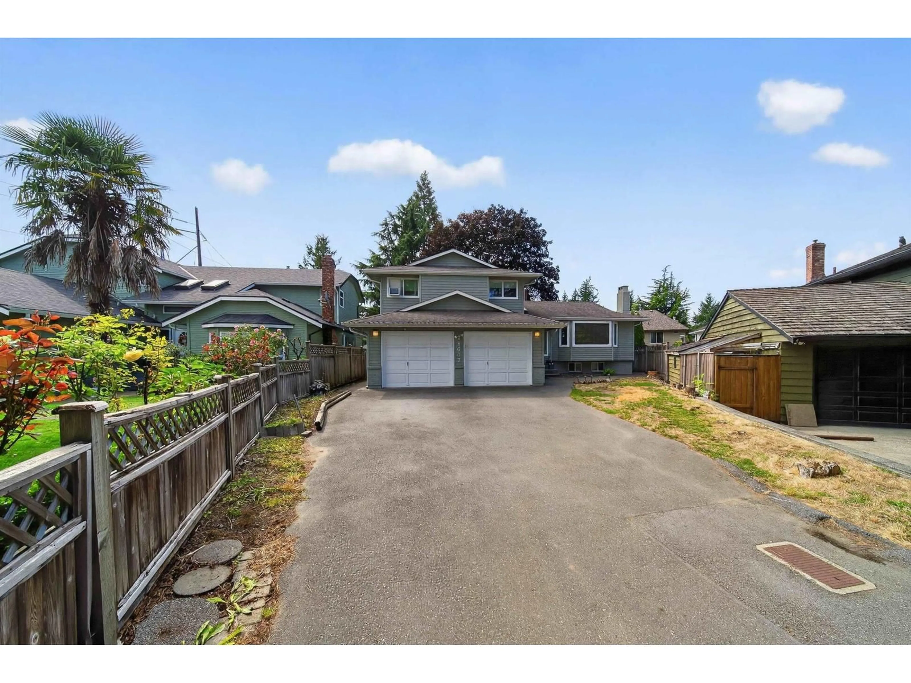 A pic from outside/outdoor area/front of a property/back of a property/a pic from drone, street for 8607 BYRON, Delta British Columbia V4C7P7