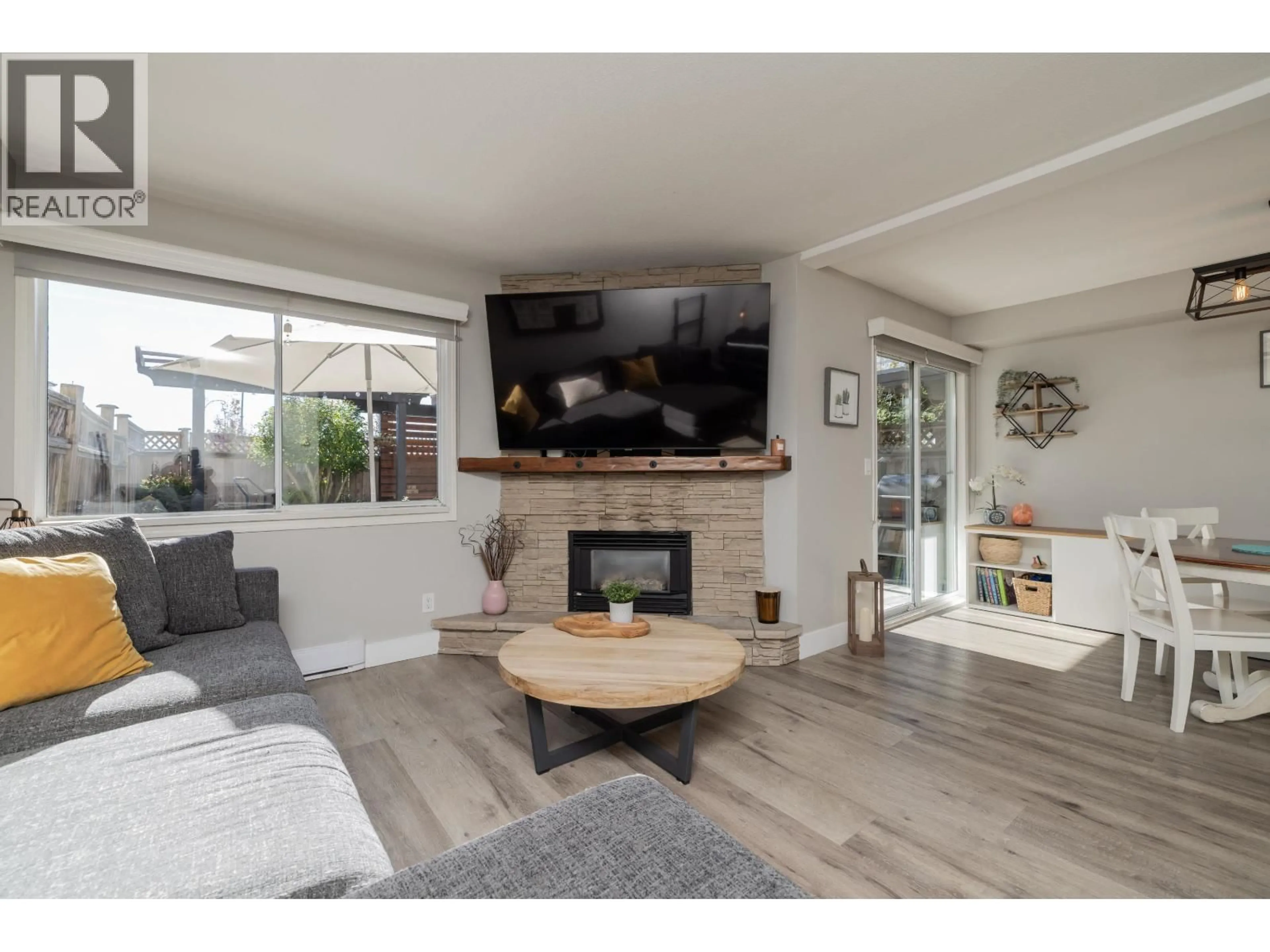 Living room with furniture, wood/laminate floor for 13 - 1872 HARBOUR STREET, Port Coquitlam British Columbia V3C1A3