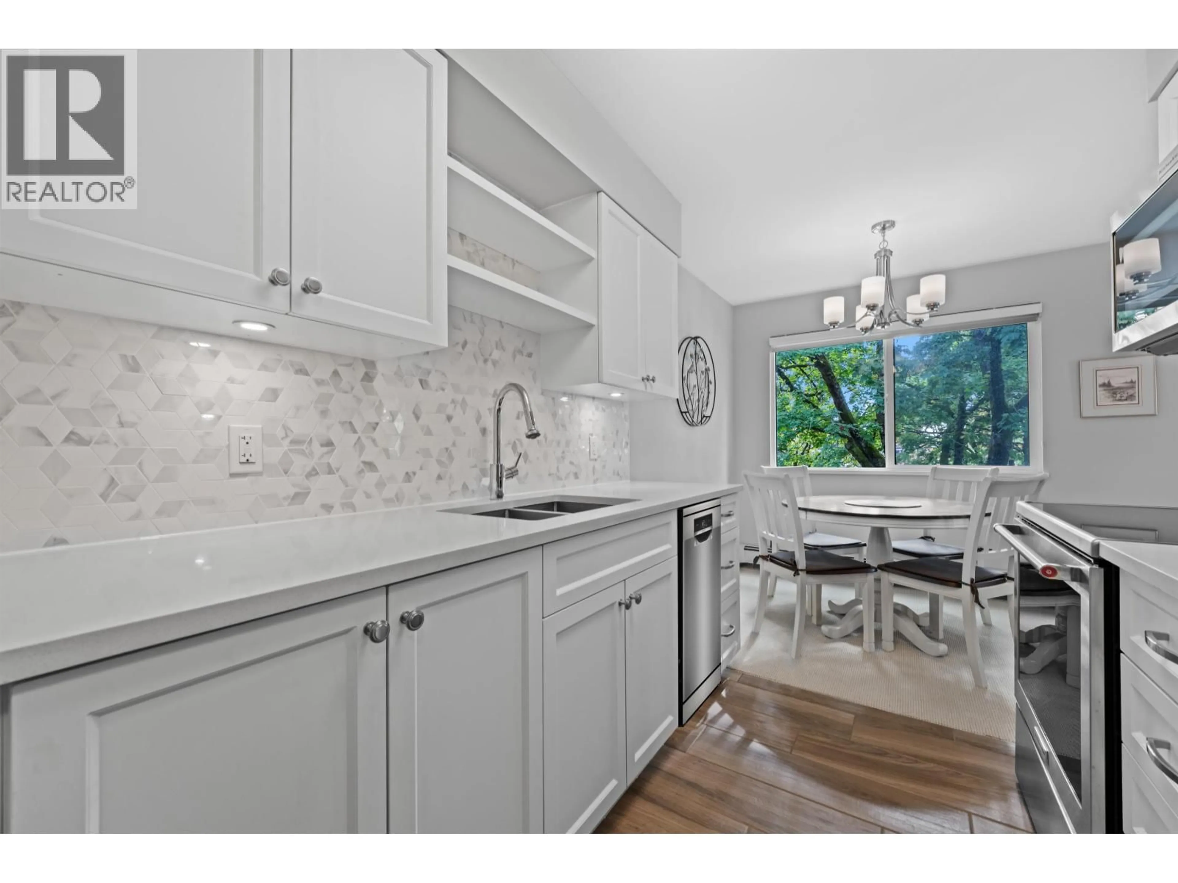 Open concept kitchen, ceramic/tile floor for 305 - 8775 CARTIER STREET, Vancouver British Columbia V6P4V3