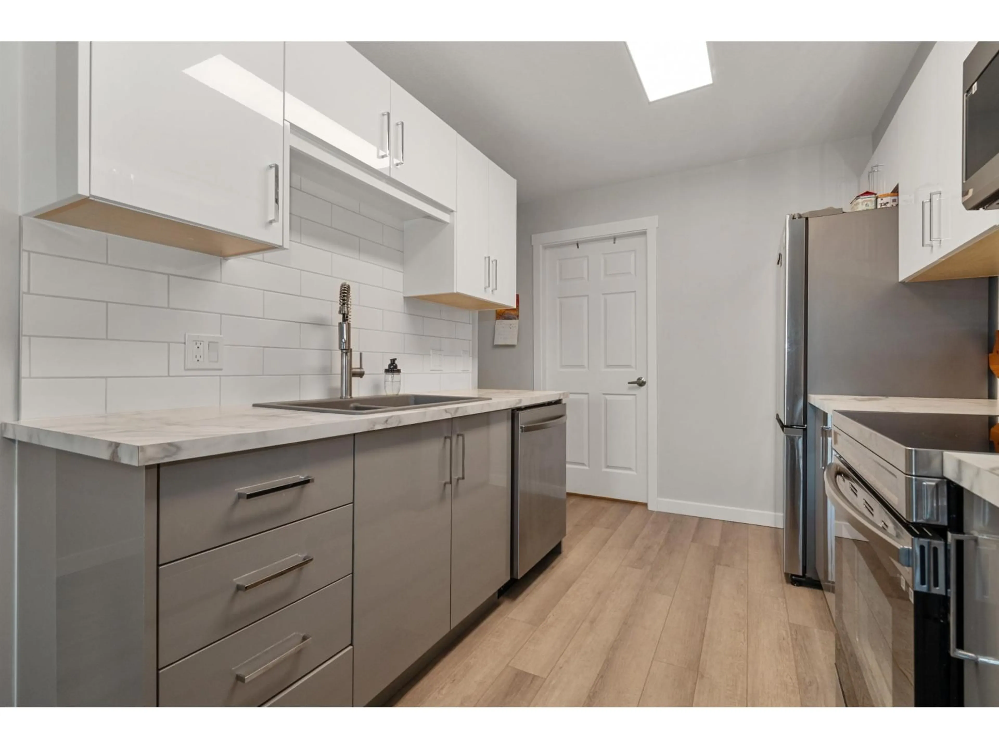 Standard kitchen, wood/laminate floor for 411 - 7694 EVANS ROAD, Chilliwack British Columbia V2R3W3