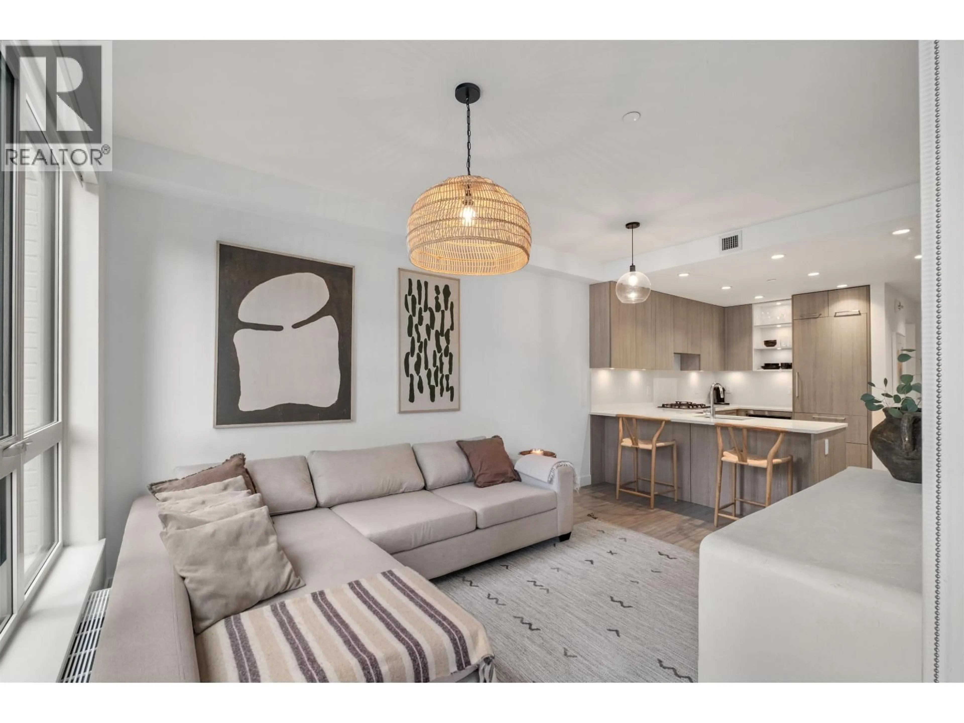 Living room with furniture, unknown for 102 - 733 3RD STREET, North Vancouver British Columbia V7L1G8