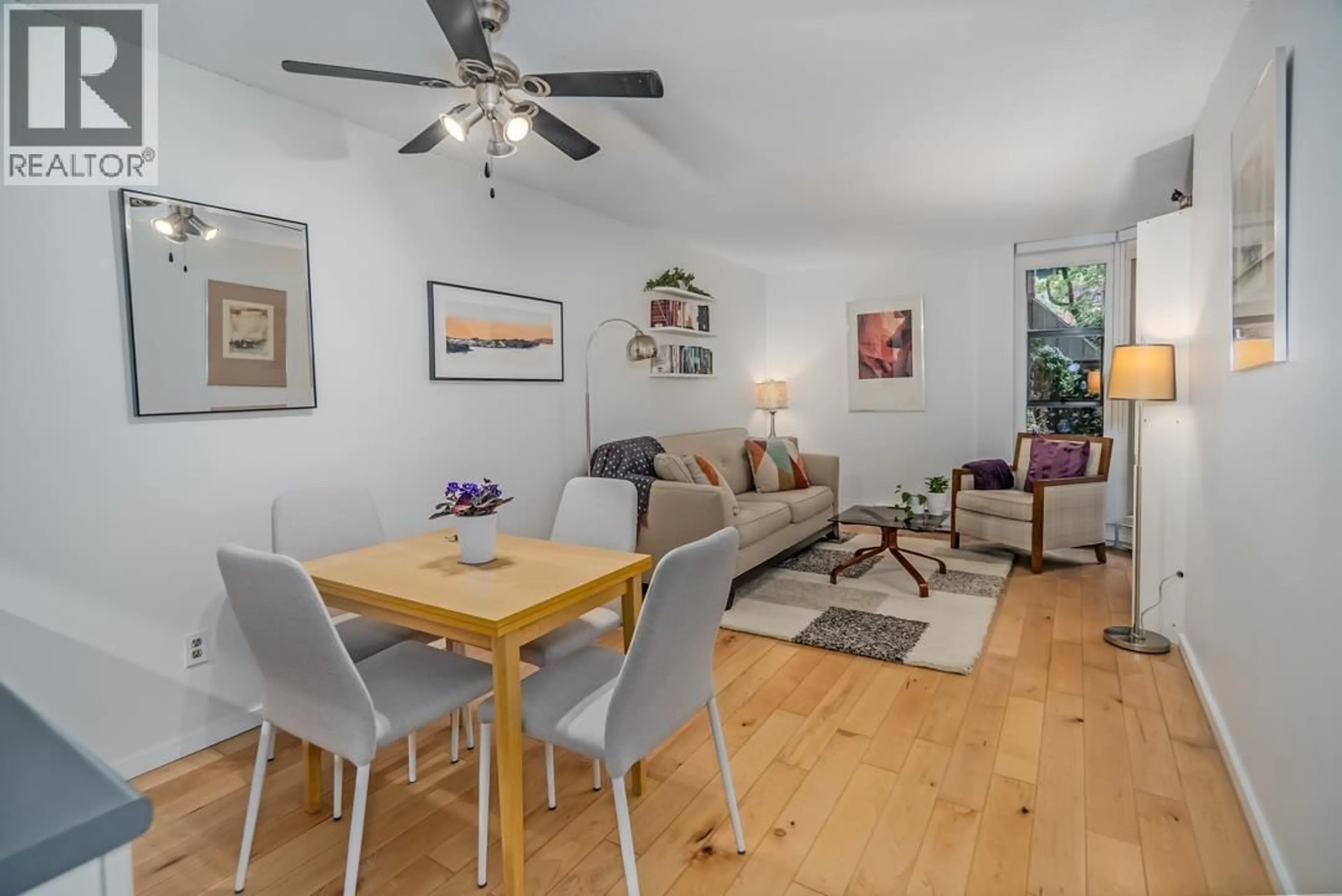 Living room with furniture, wood/laminate floor for 216 - 1080 PACIFIC STREET, Vancouver British Columbia V6E4C2