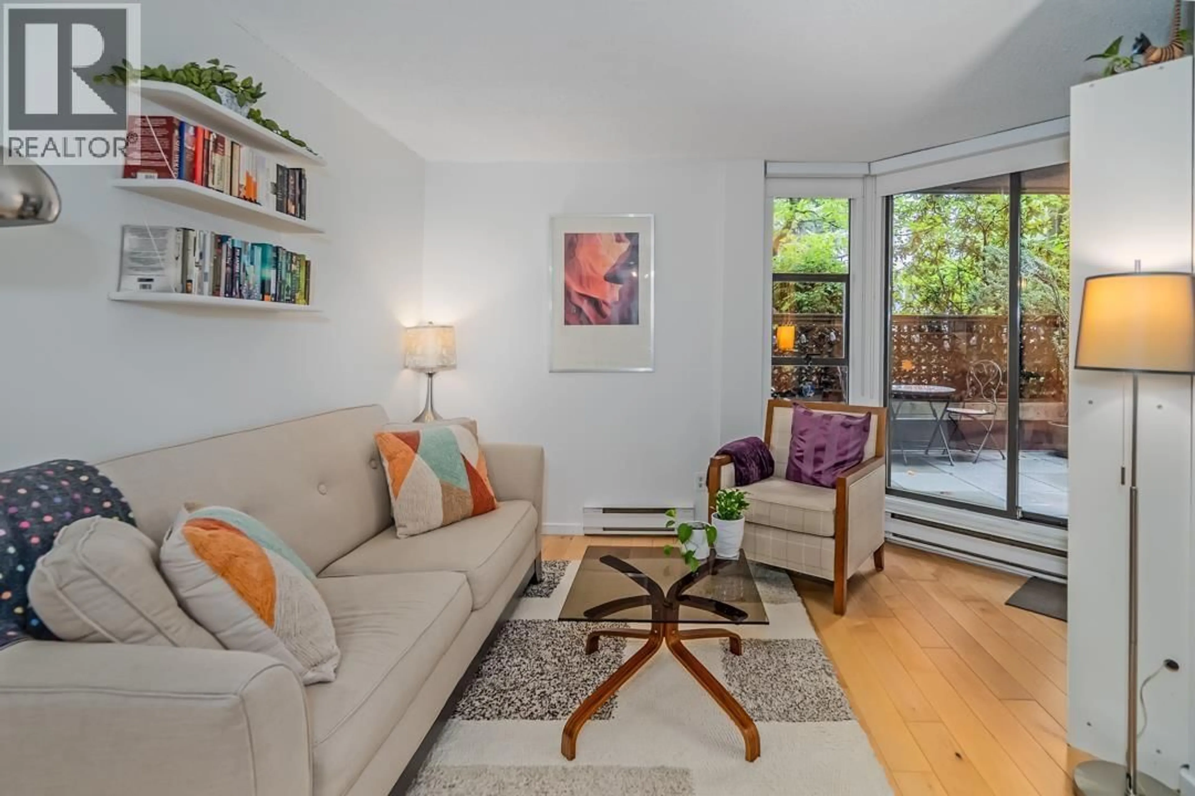 Living room with furniture, wood/laminate floor for 216 - 1080 PACIFIC STREET, Vancouver British Columbia V6E4C2