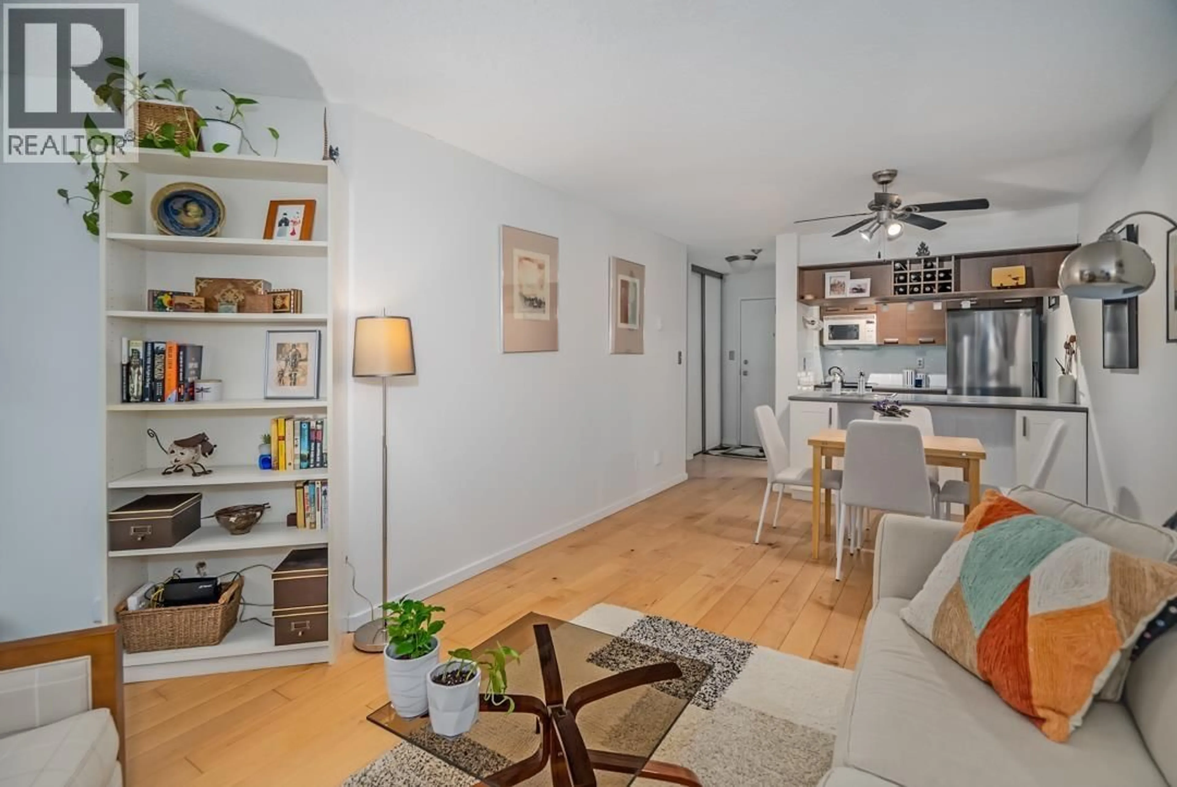 Living room with furniture, wood/laminate floor for 216 - 1080 PACIFIC STREET, Vancouver British Columbia V6E4C2