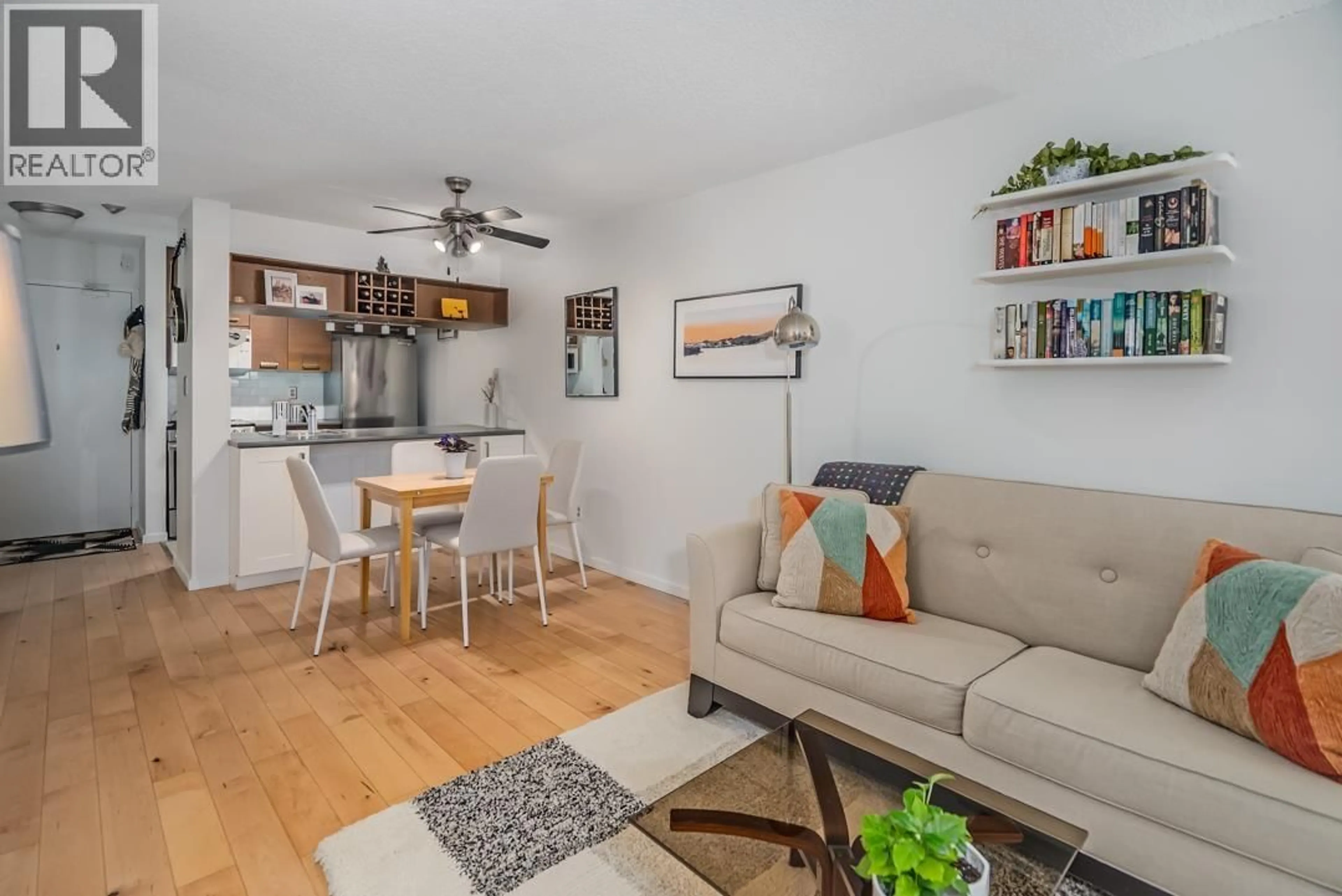 Living room with furniture, wood/laminate floor for 216 - 1080 PACIFIC STREET, Vancouver British Columbia V6E4C2