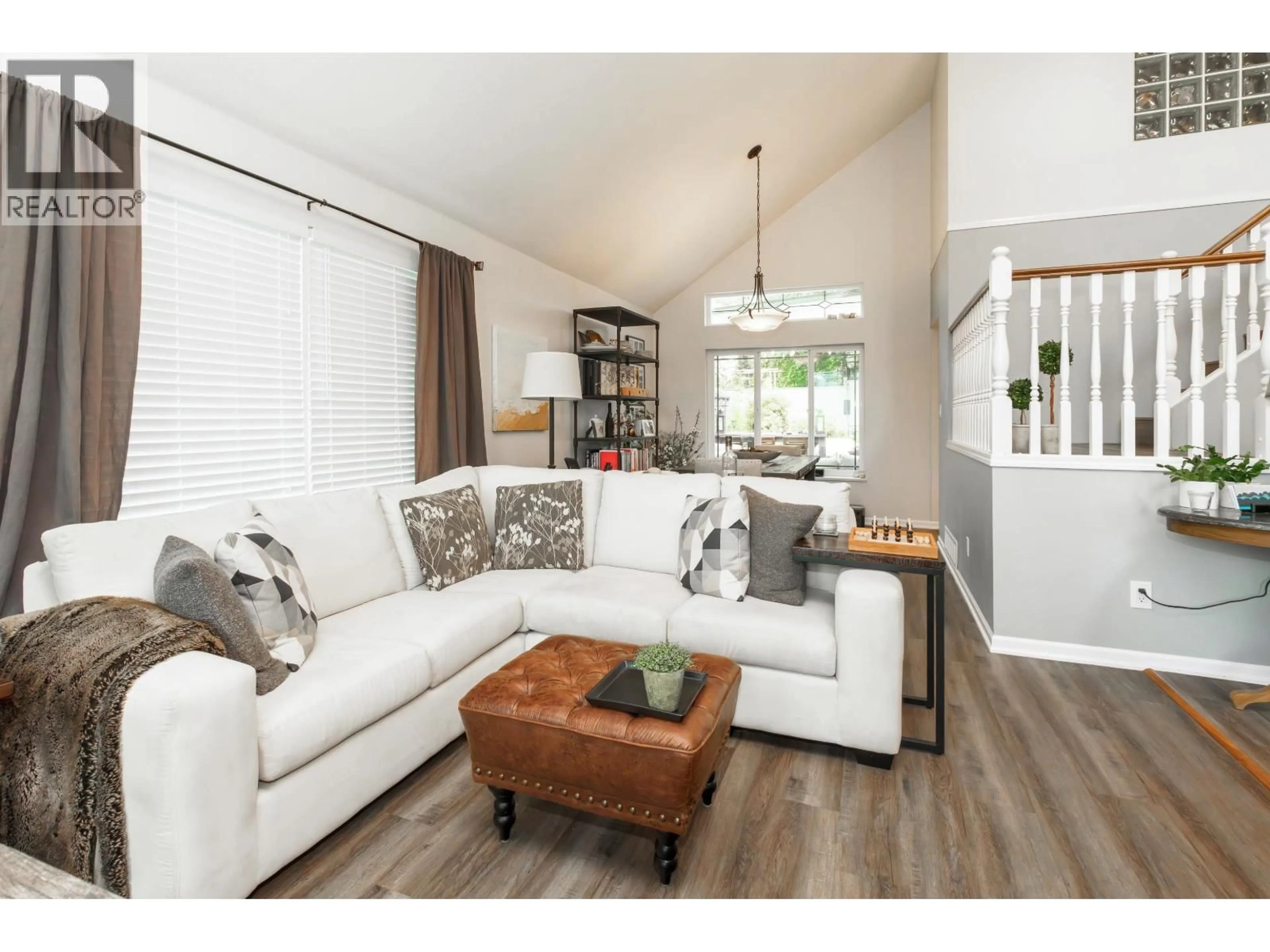 Living room with furniture, wood/laminate floor for 23508 TAMARACK LANE, Maple Ridge British Columbia V2W1A9