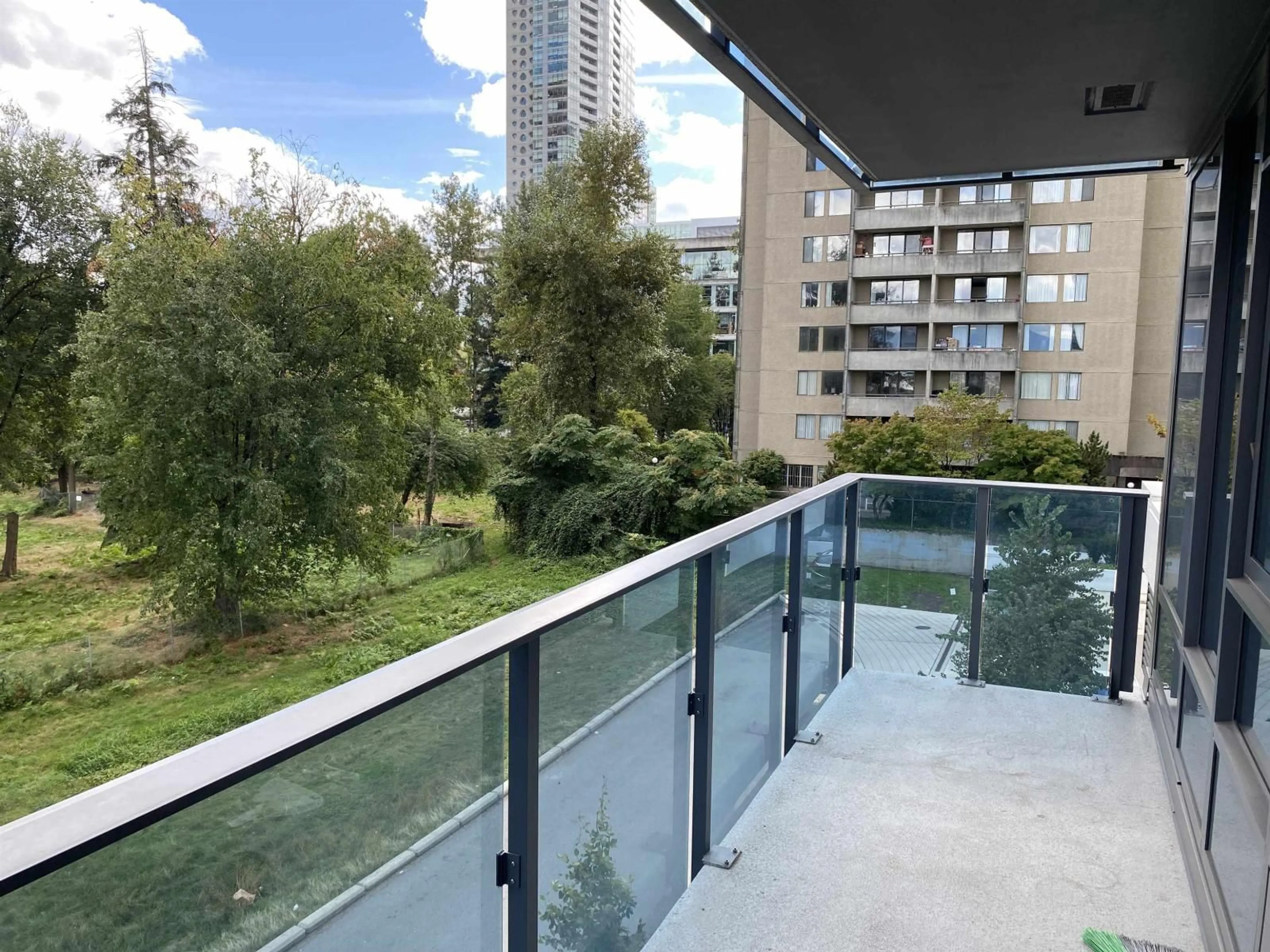 Balcony in the apartment, city buildings view from balcony for 307 - 13428 105, Surrey British Columbia V3T0S6