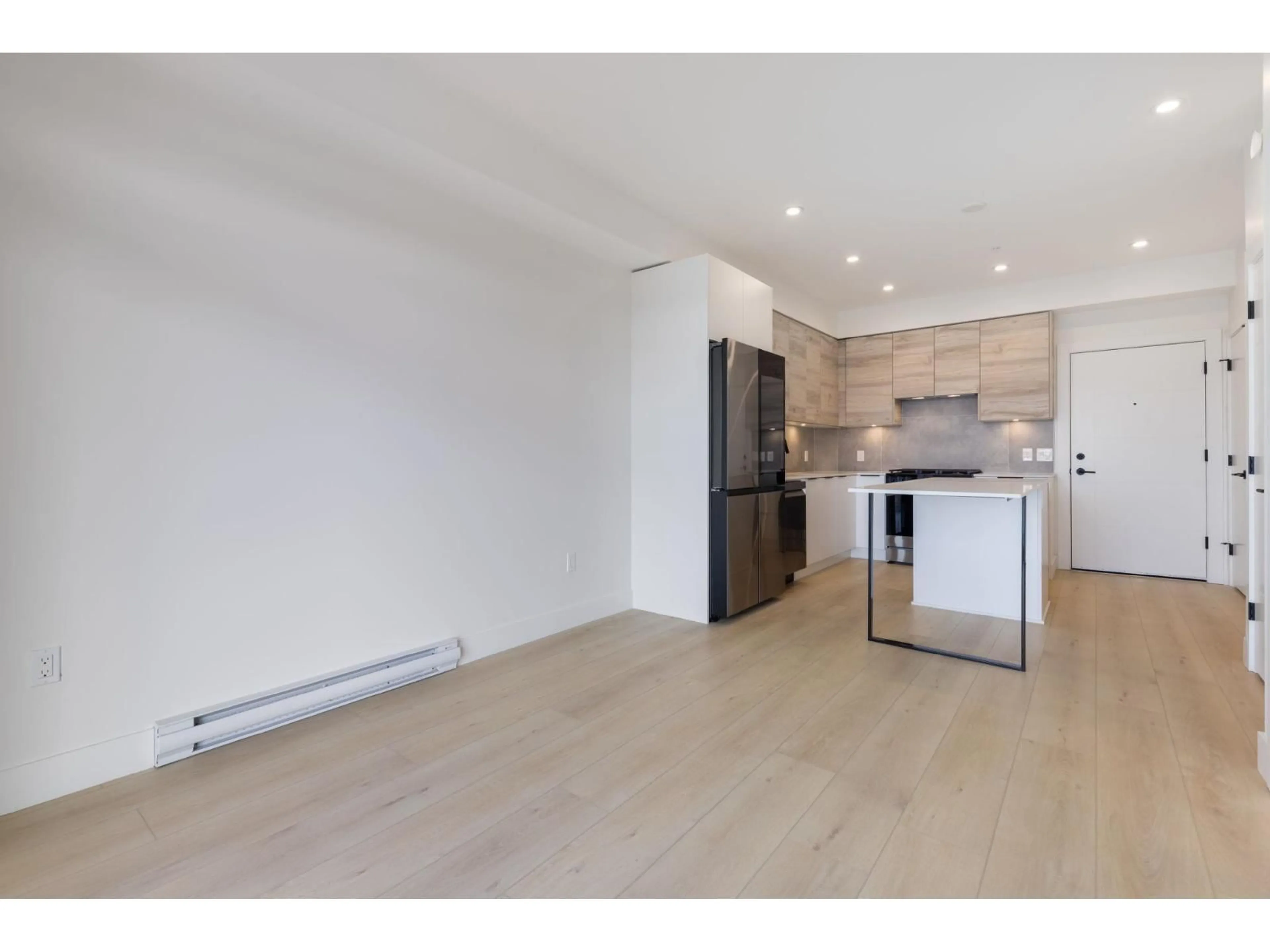 Open concept kitchen, wood/laminate floor for 207 - 30490 CARDINAL, Abbotsford British Columbia V2T0C5