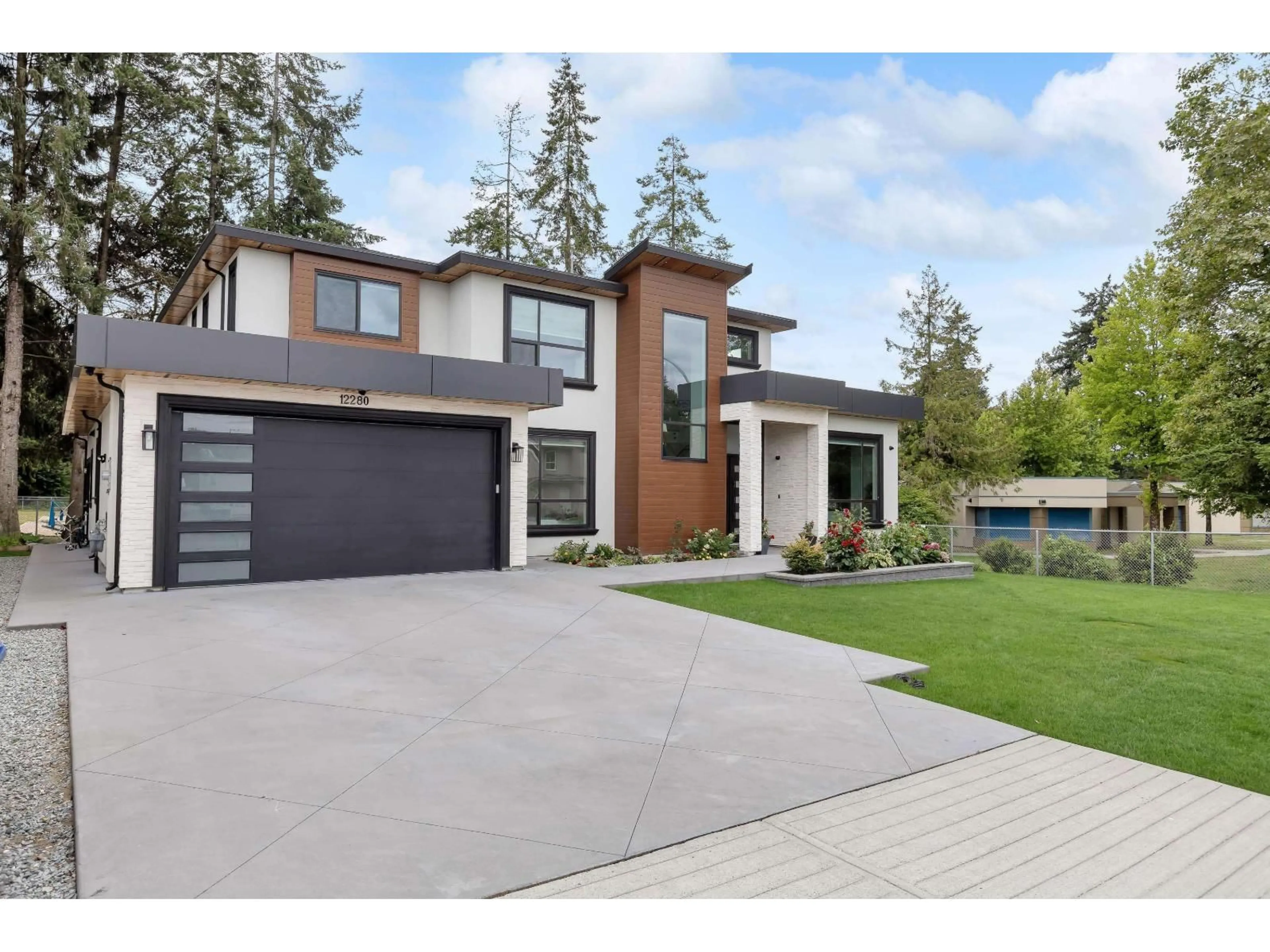 Home with brick exterior material, street for 12280 70A, Surrey British Columbia V3W4Z8