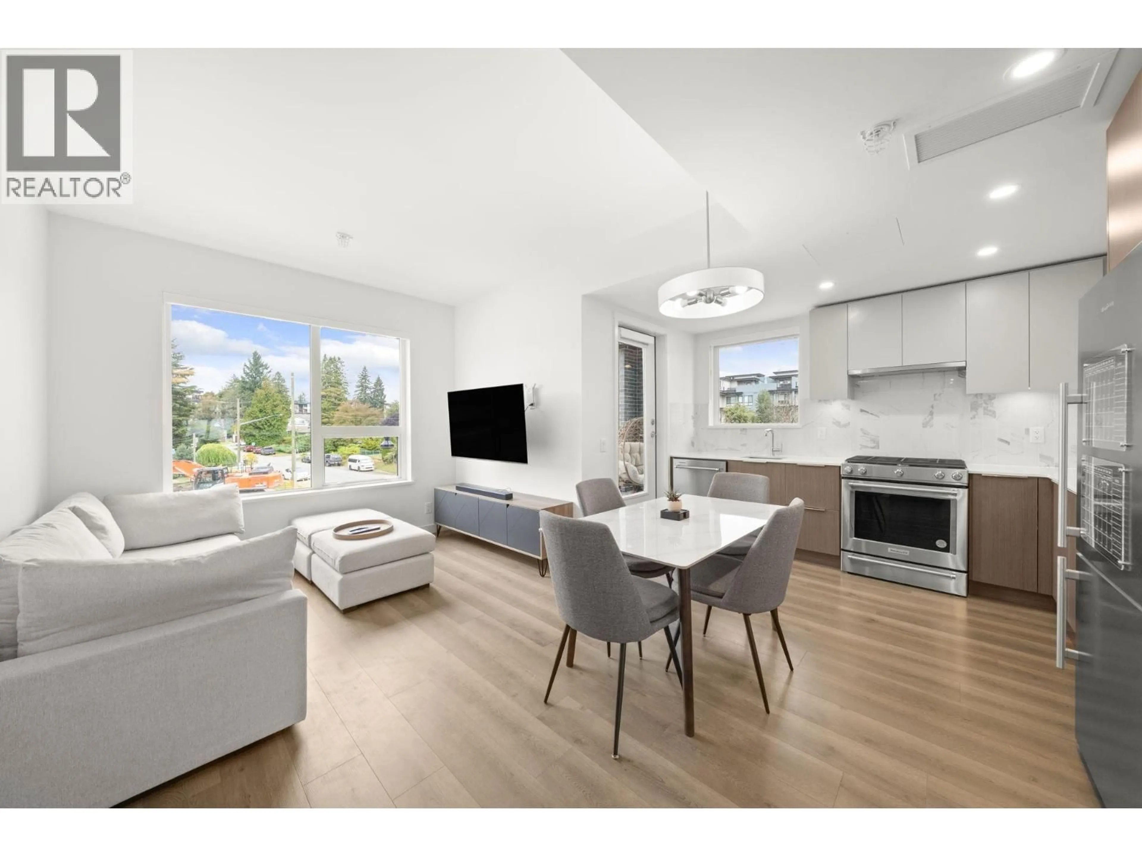 Open concept kitchen, wood/laminate floor for 314 - 648 LEA AVENUE, Coquitlam British Columbia V3J0P1