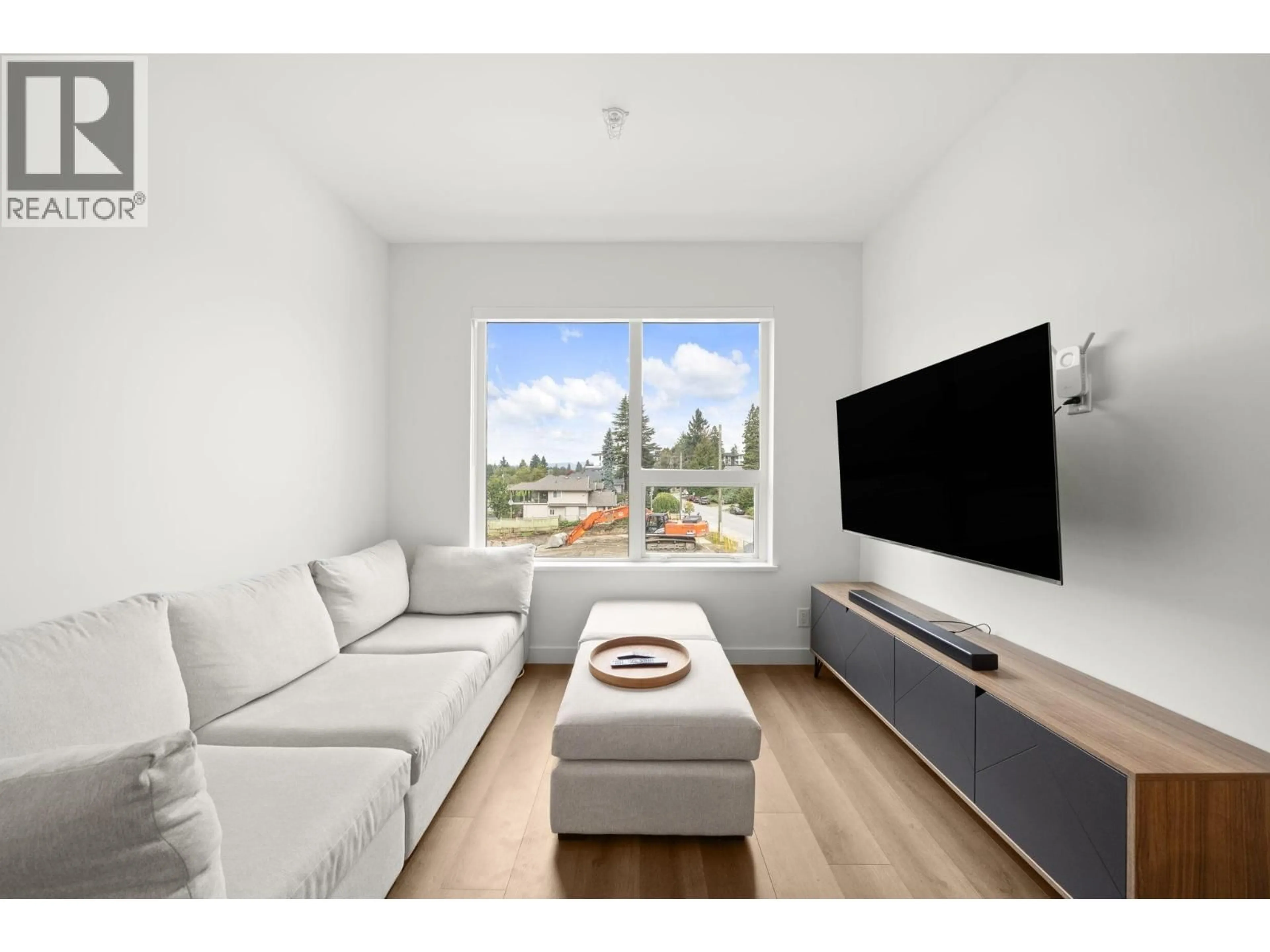 Living room with furniture, wood/laminate floor for 314 - 648 LEA AVENUE, Coquitlam British Columbia V3J0P1