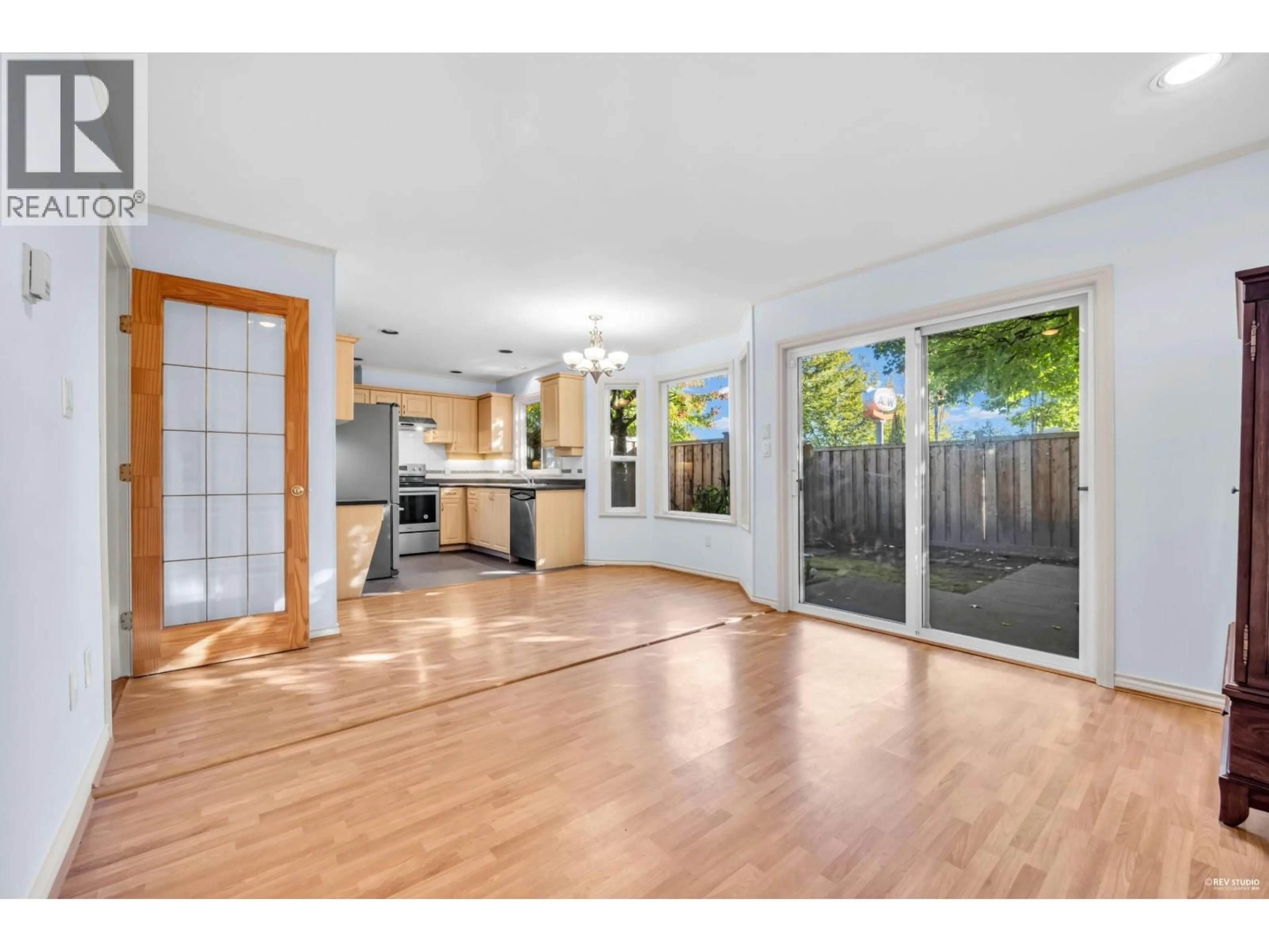 Open concept kitchen, wood/laminate floor for 6 - 8151 GARDEN CITY ROAD, Richmond British Columbia V6Y2P1