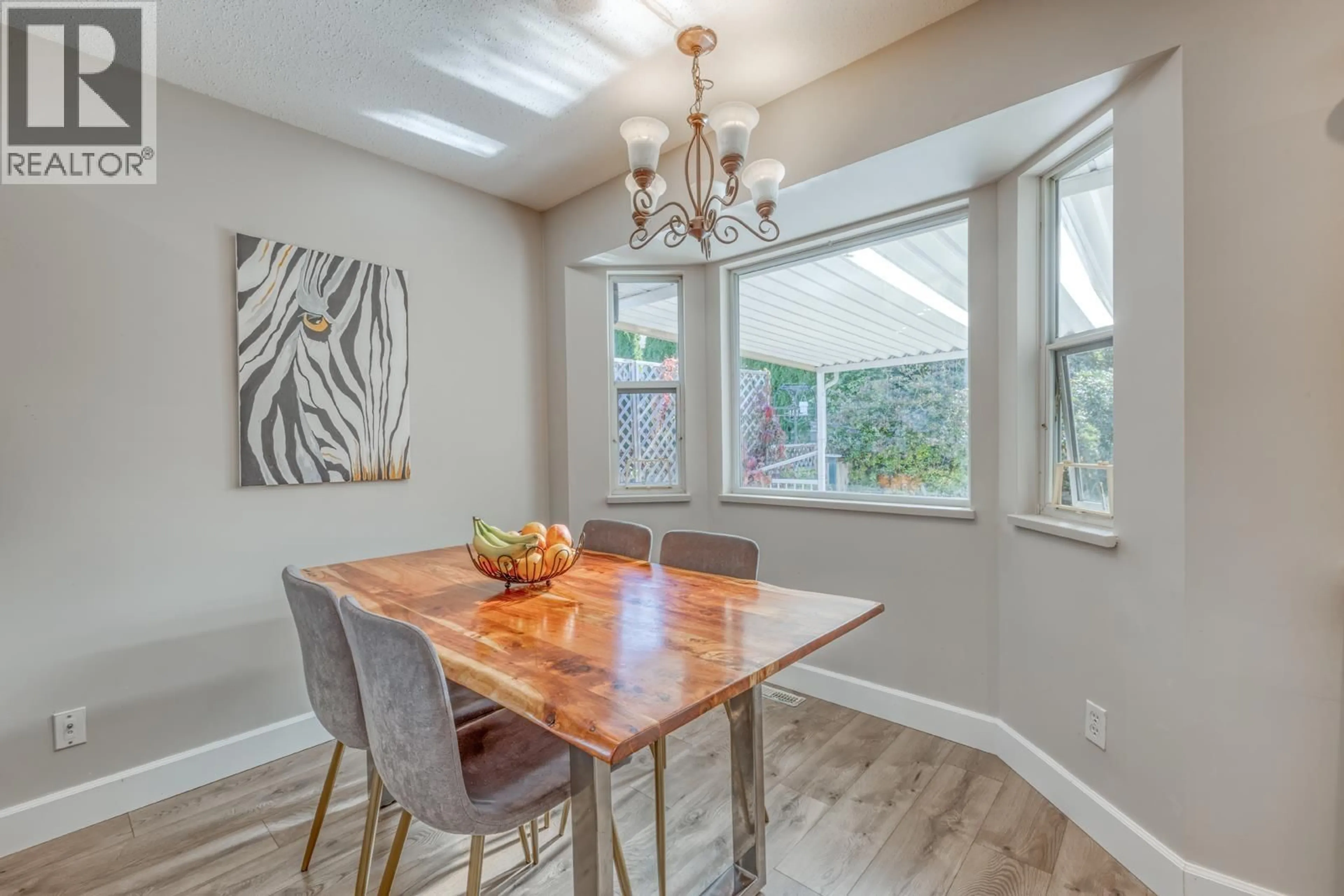 Dining room, wood/laminate floor for 22970 126 AVENUE, Maple Ridge British Columbia V2X0S7