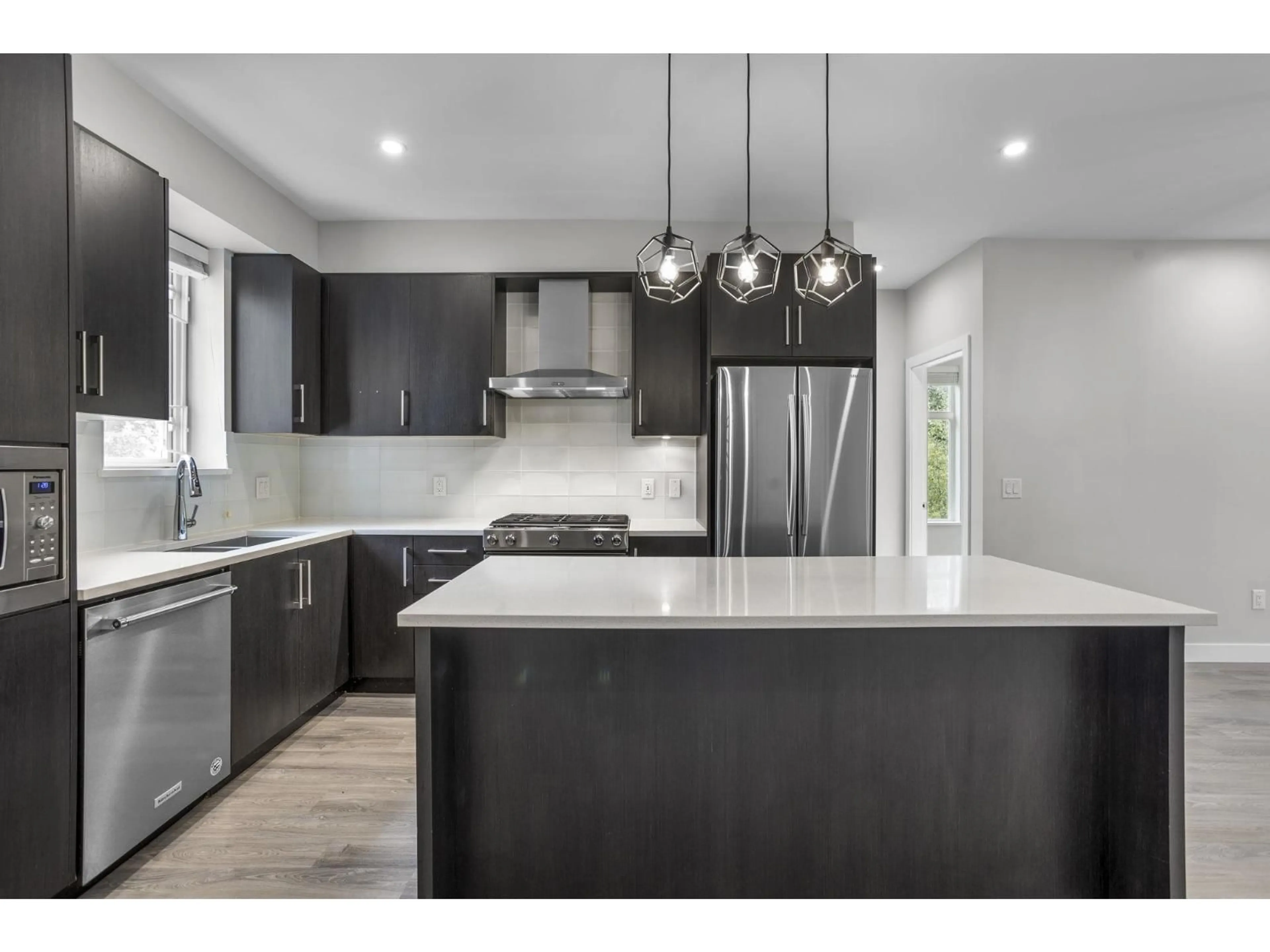 Open concept kitchen, unknown for 306 - 15436 31, Surrey British Columbia V3Z1H3
