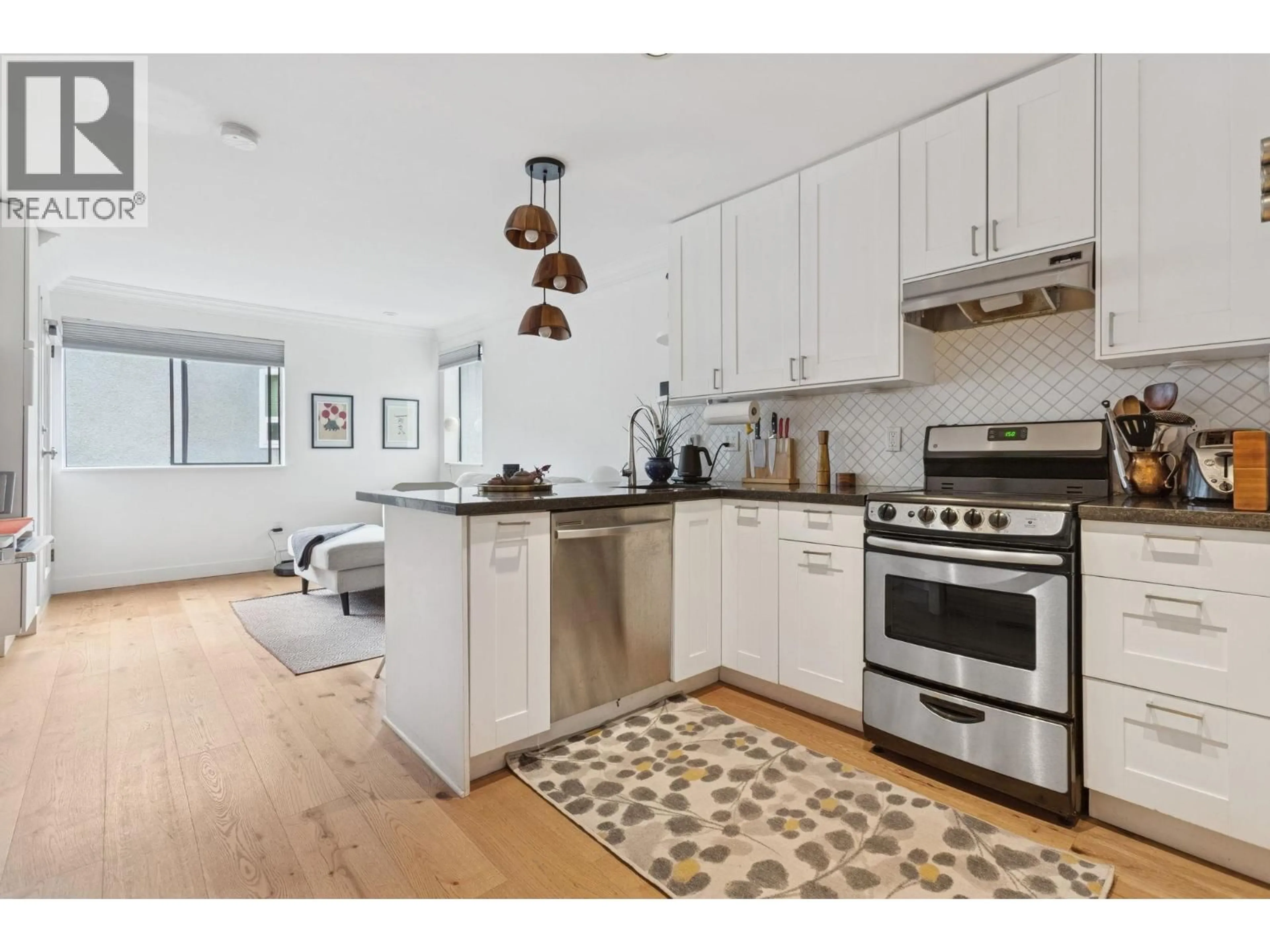 Open concept kitchen, unknown for 204 - 853 7TH AVENUE, Vancouver British Columbia V5T1P4