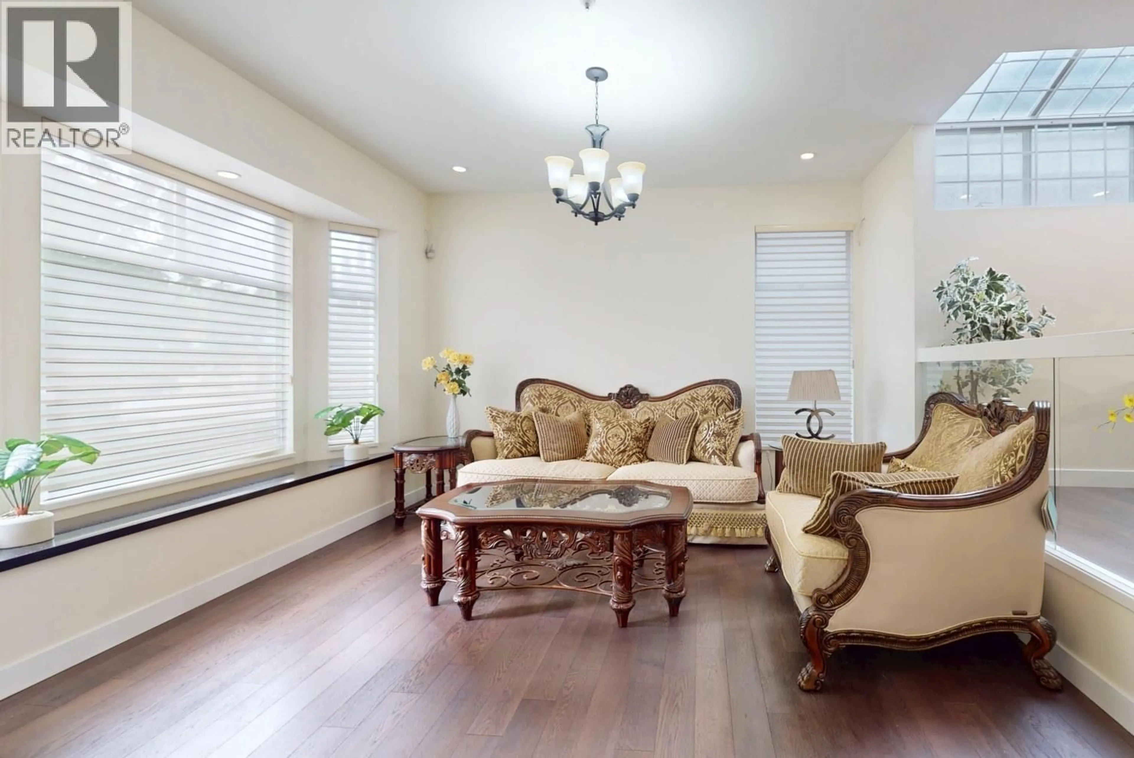 Living room with furniture, wood/laminate floor for 2789 24TH AVENUE, Vancouver British Columbia V6L1R2