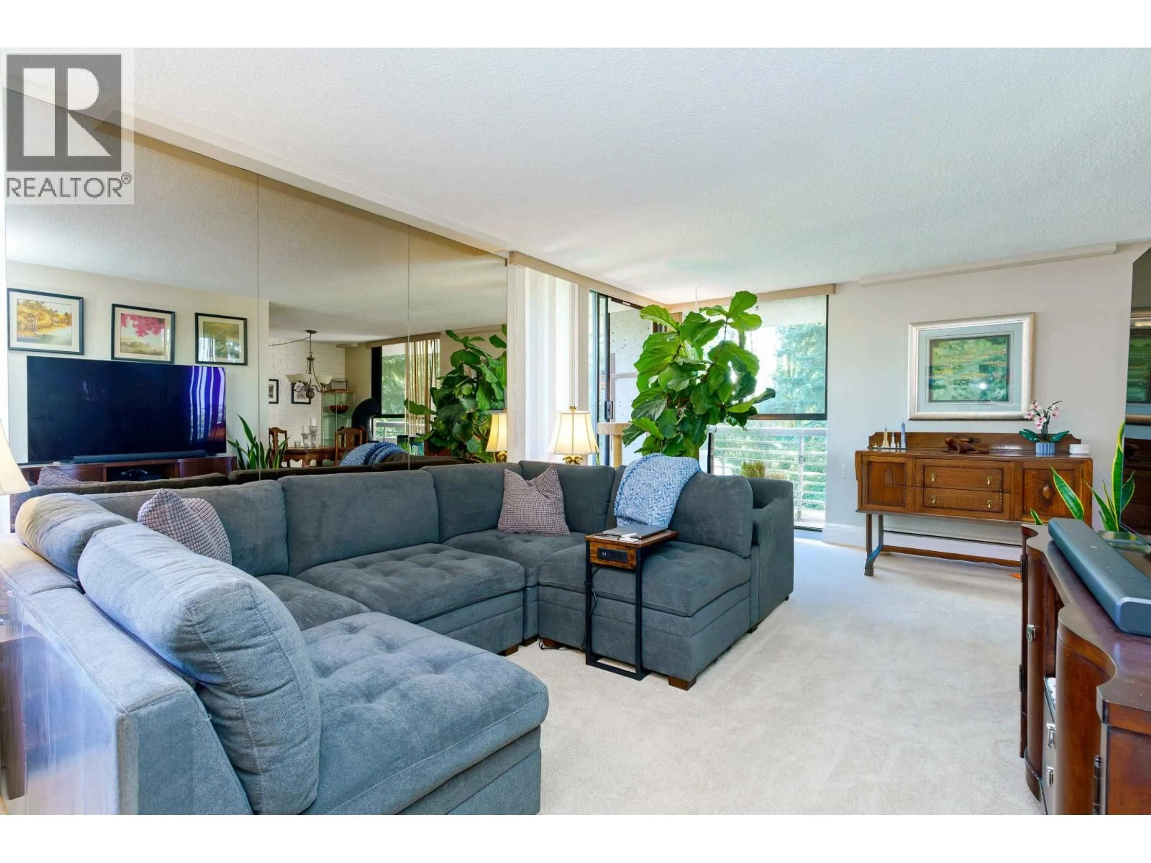 Living room with furniture, unknown for 303 - 3737 BARTLETT COURT, Burnaby British Columbia V3J7E3