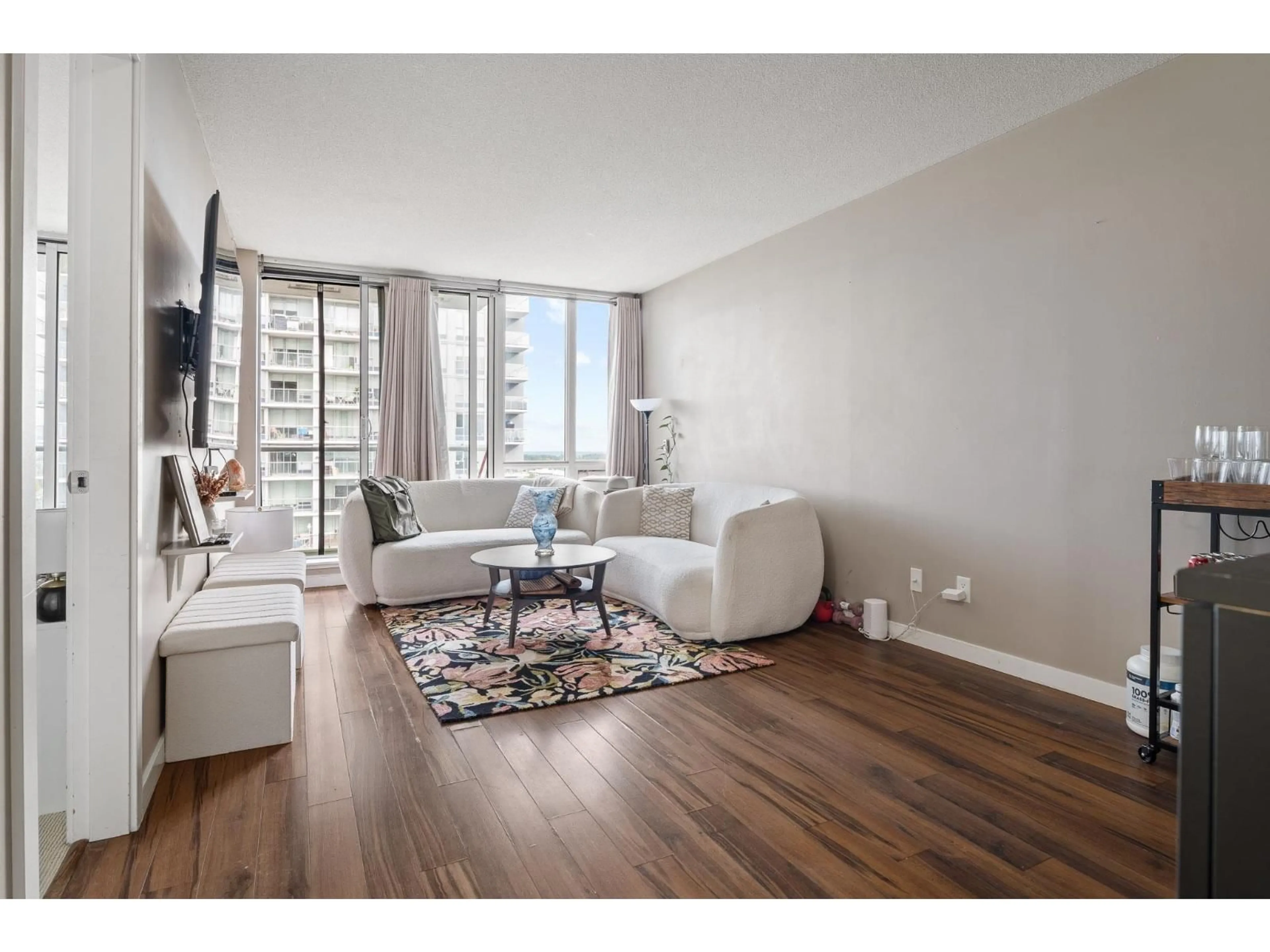 Living room with furniture, wood/laminate floor for 3008 - 13688 100, Surrey British Columbia V3T0G5