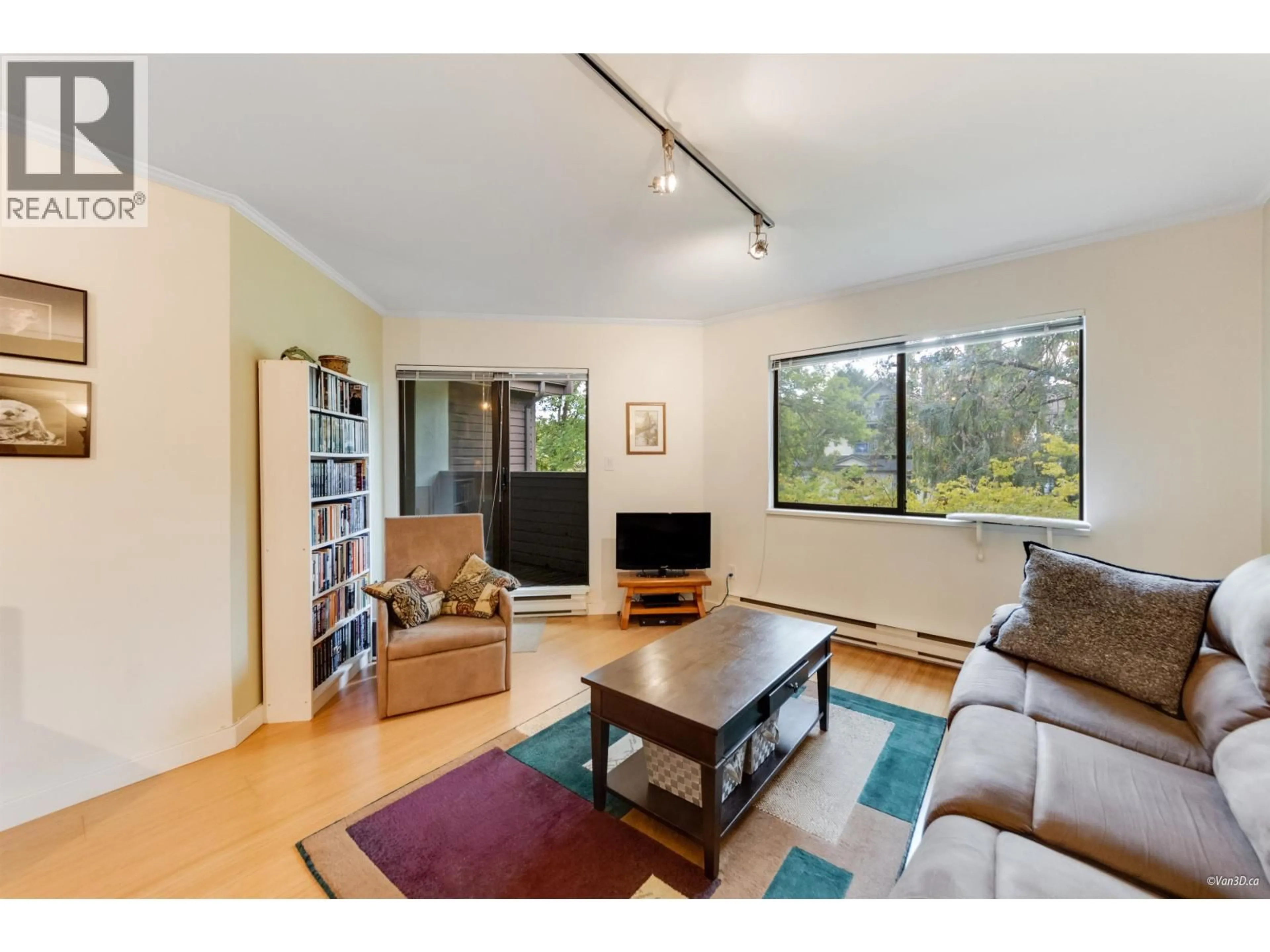 Living room with furniture, wood/laminate floor for 302 - 1633 11TH AVENUE, Vancouver British Columbia V6J2B8