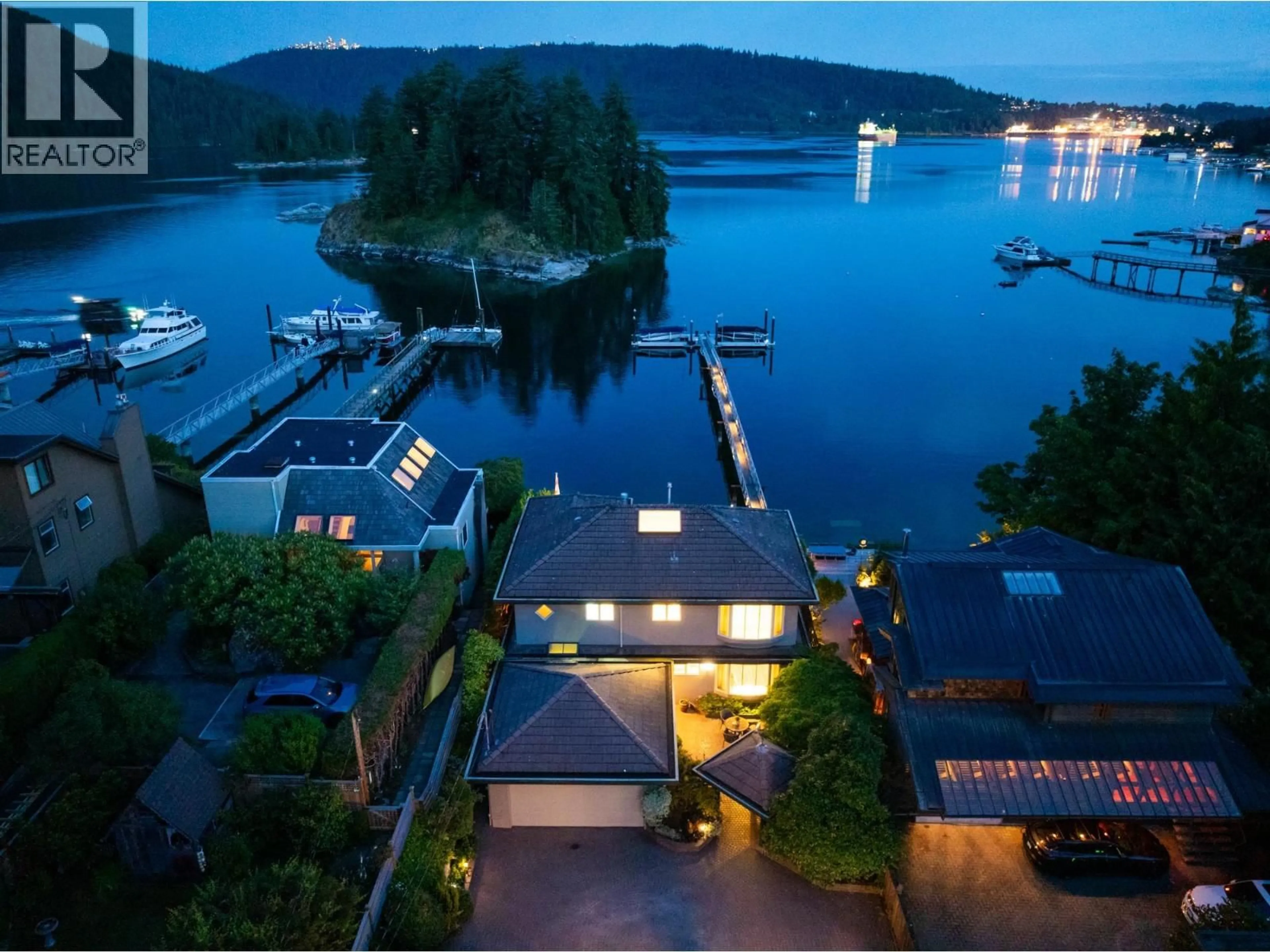 A pic from outside/outdoor area/front of a property/back of a property/a pic from drone, water/lake/river/ocean view for 4625 STRATHCONA ROAD, North Vancouver British Columbia V7G1G7