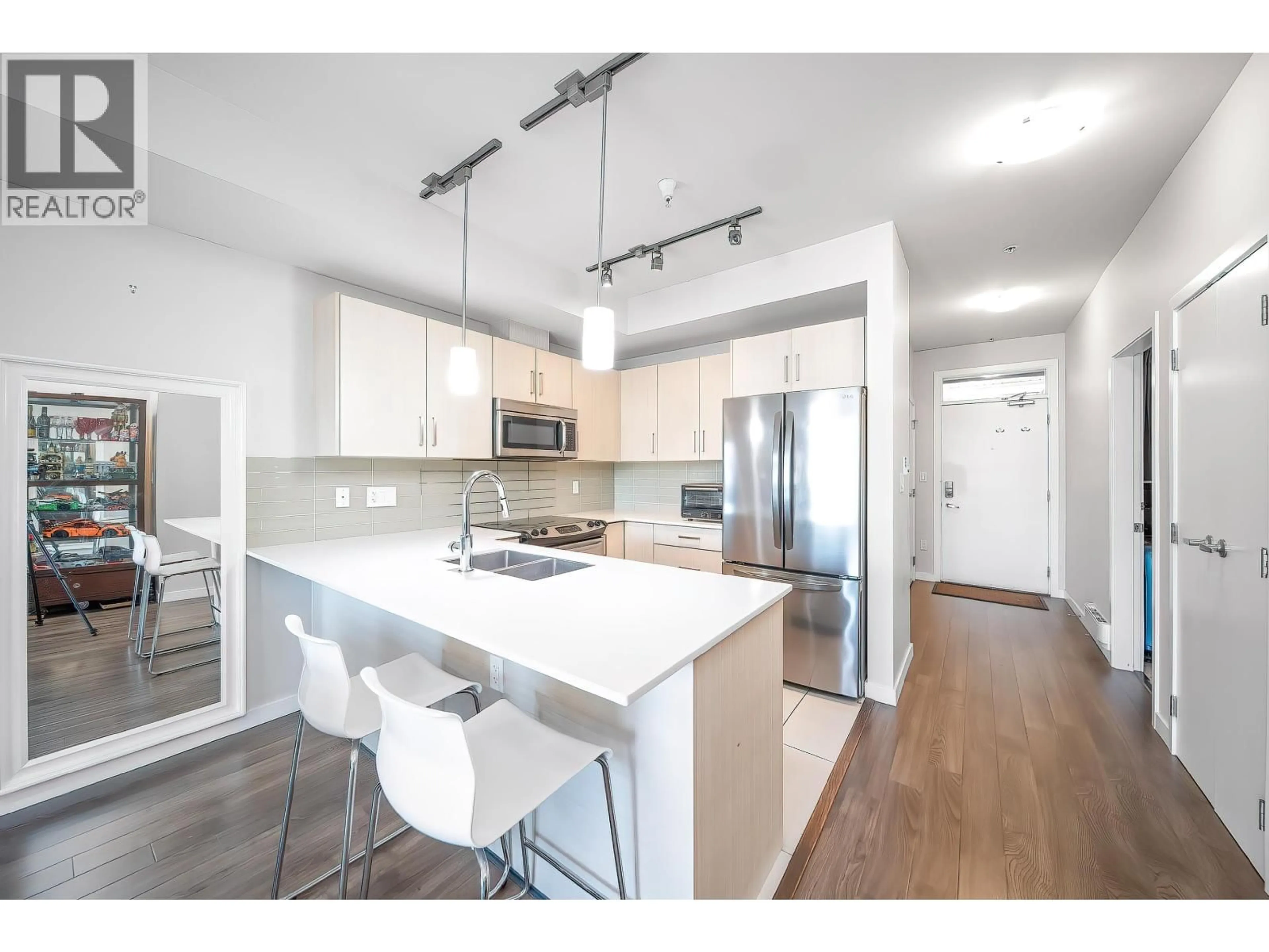 Open concept kitchen, unknown for 207 - 5288 GRIMMER STREET, Burnaby British Columbia V5H0C5