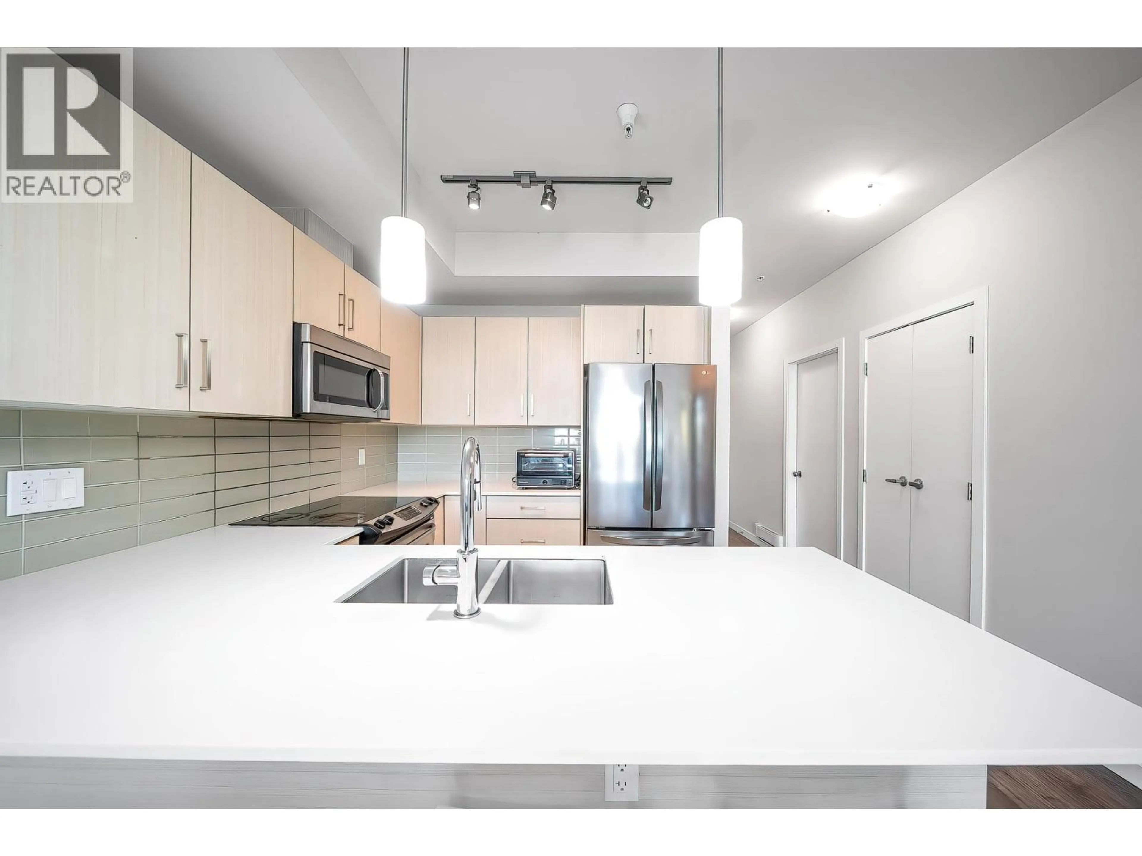 Open concept kitchen, unknown for 207 - 5288 GRIMMER STREET, Burnaby British Columbia V5H0C5