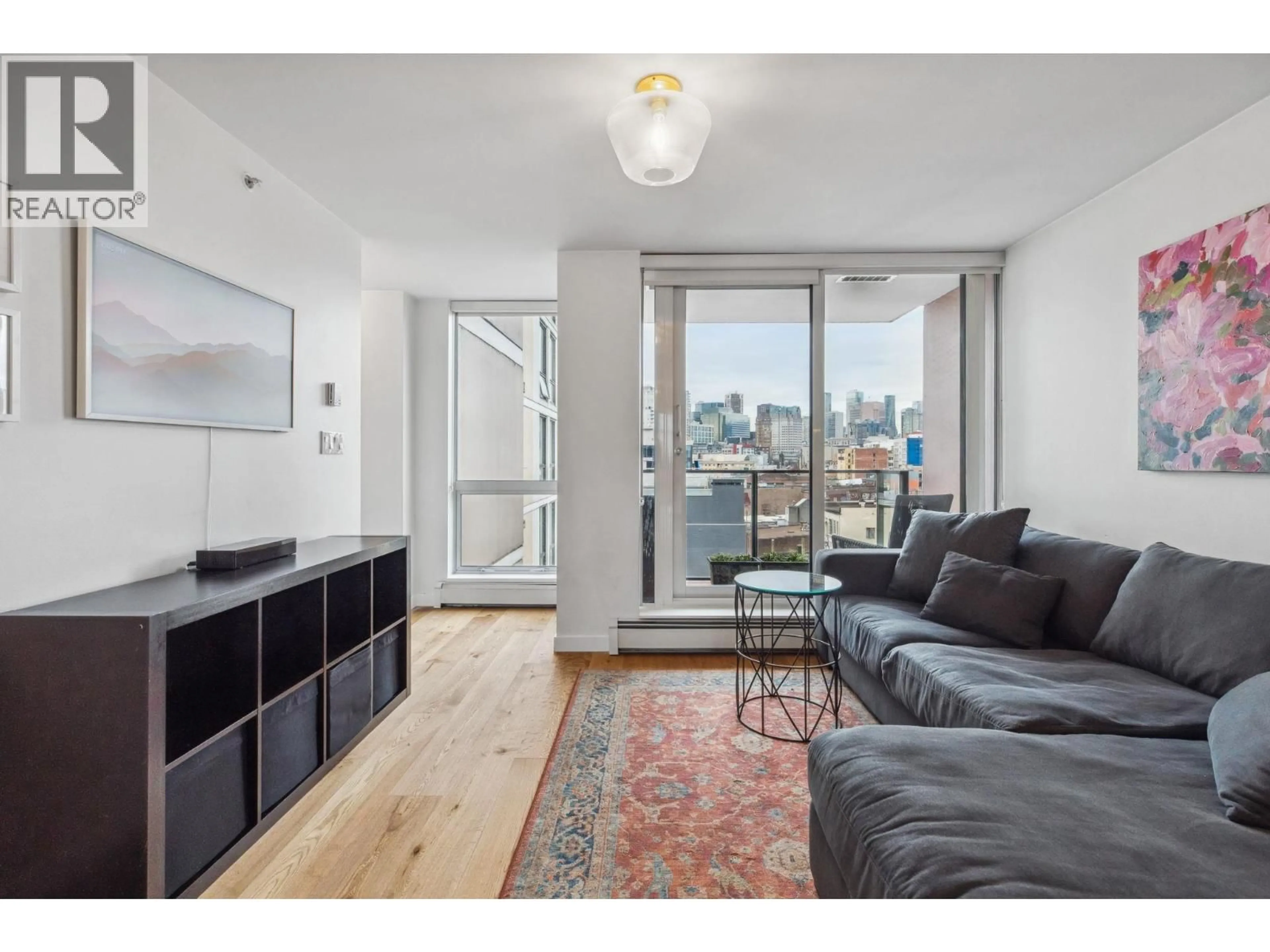 Living room with furniture, wood/laminate floor for 808 - 189 KEEFER STREET, Vancouver British Columbia V6A0C8