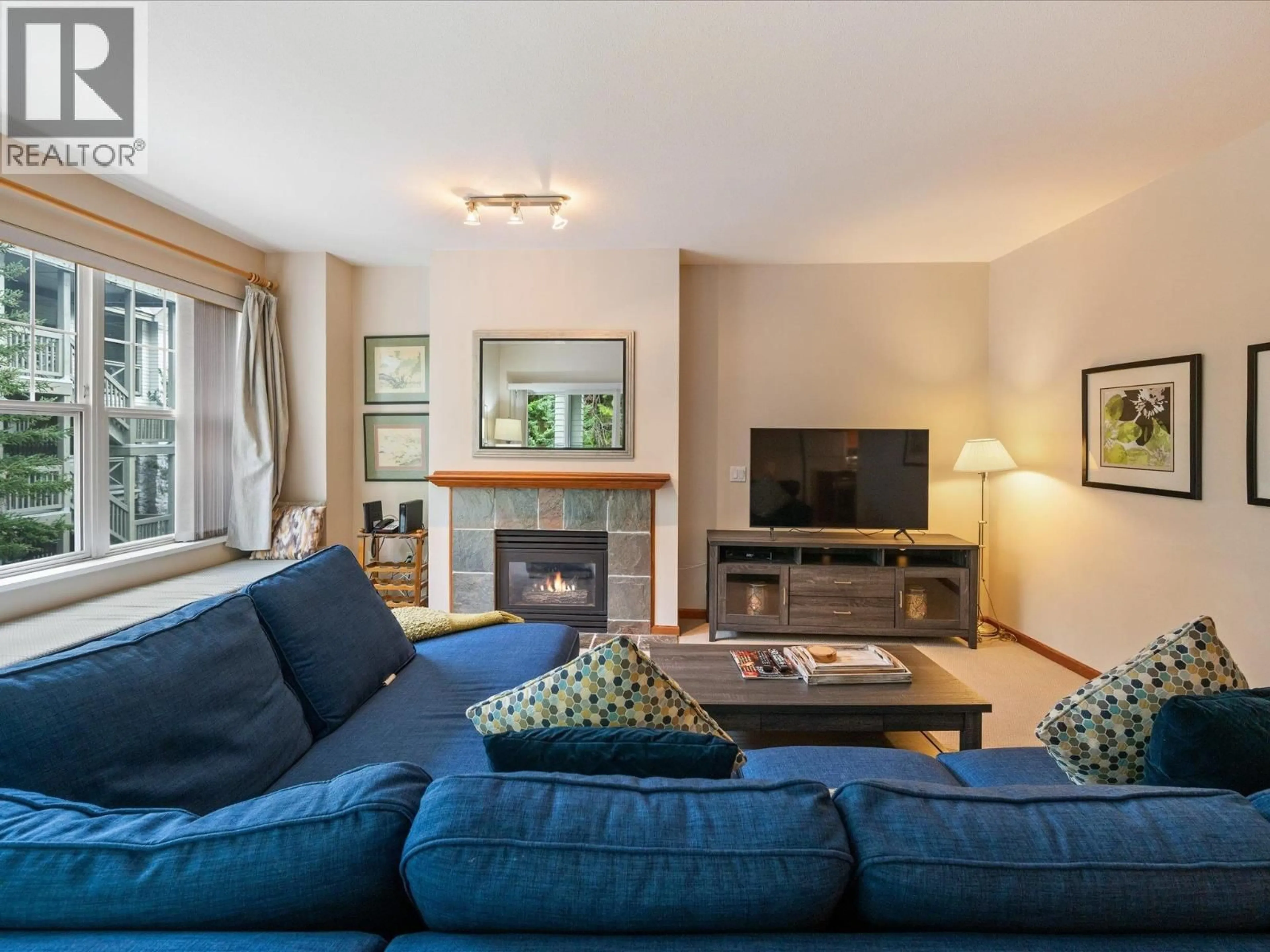 Living room with furniture, unknown for 203 - 3300 PTARMIGAN PLACE, Whistler British Columbia V8E0V5