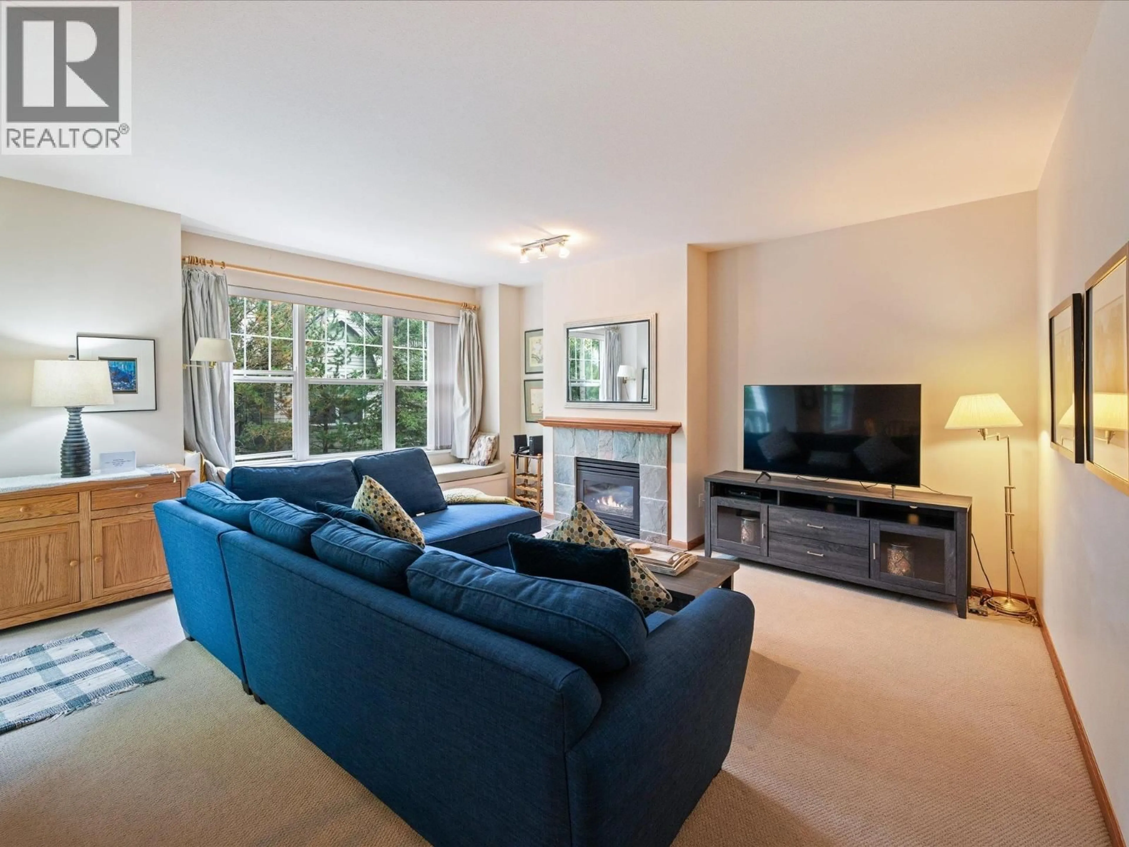 Living room with furniture, unknown for 203 - 3300 PTARMIGAN PLACE, Whistler British Columbia V8E0V5