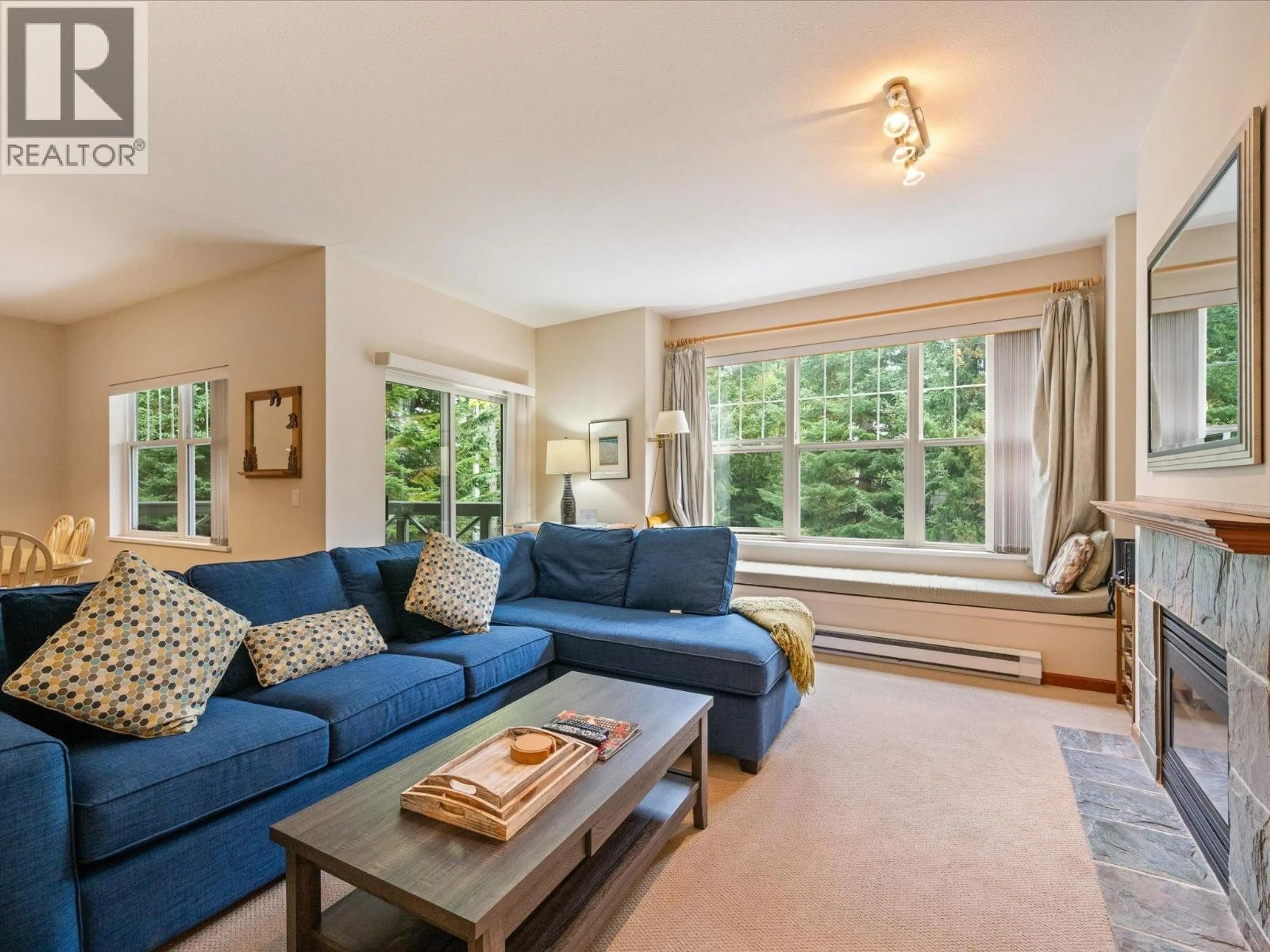 Living room with furniture, unknown for 203 - 3300 PTARMIGAN PLACE, Whistler British Columbia V8E0V5
