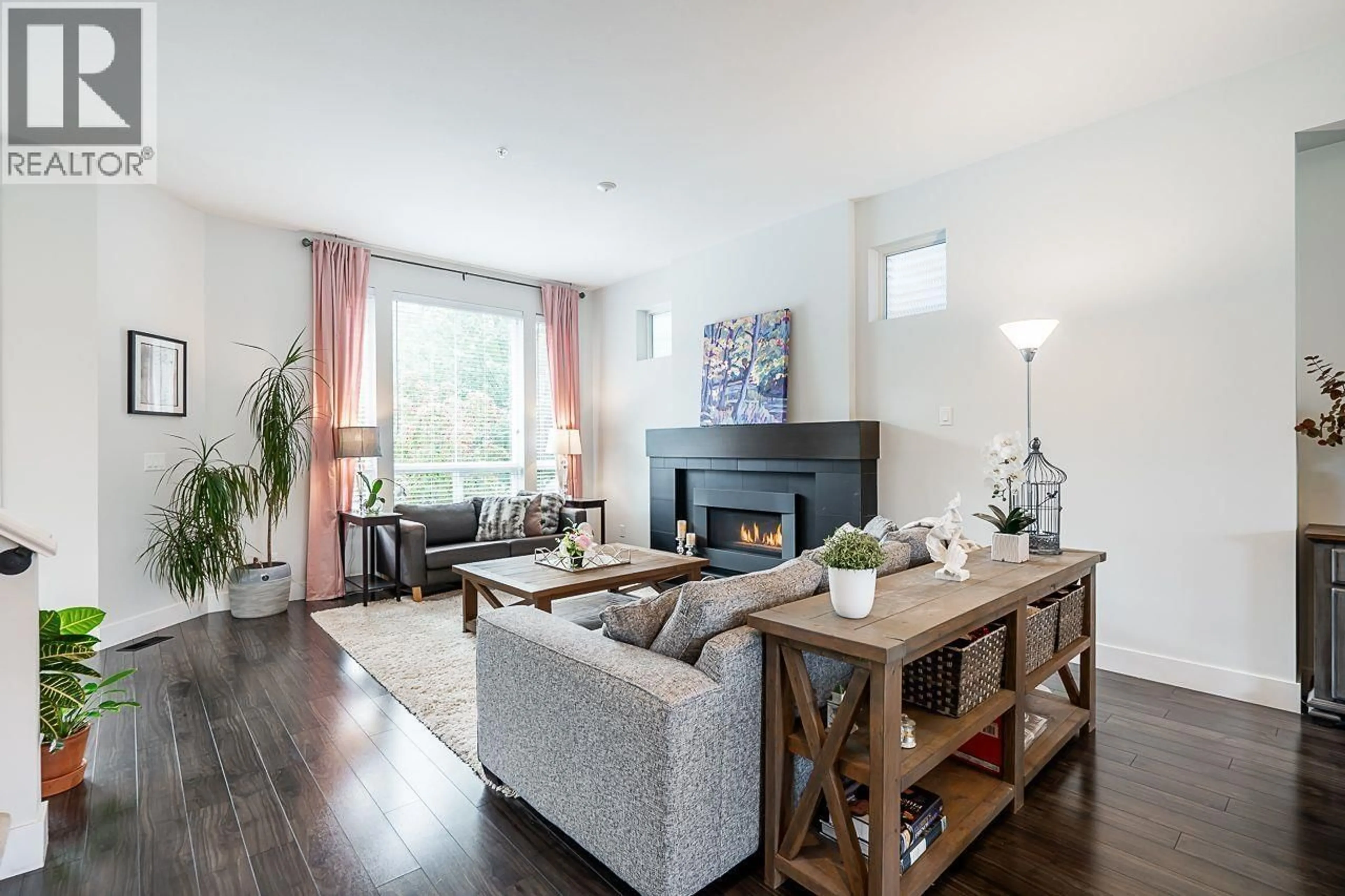 Living room with furniture, wood/laminate floor for 10489 ROBERTSON STREET, Maple Ridge British Columbia V2W0H8