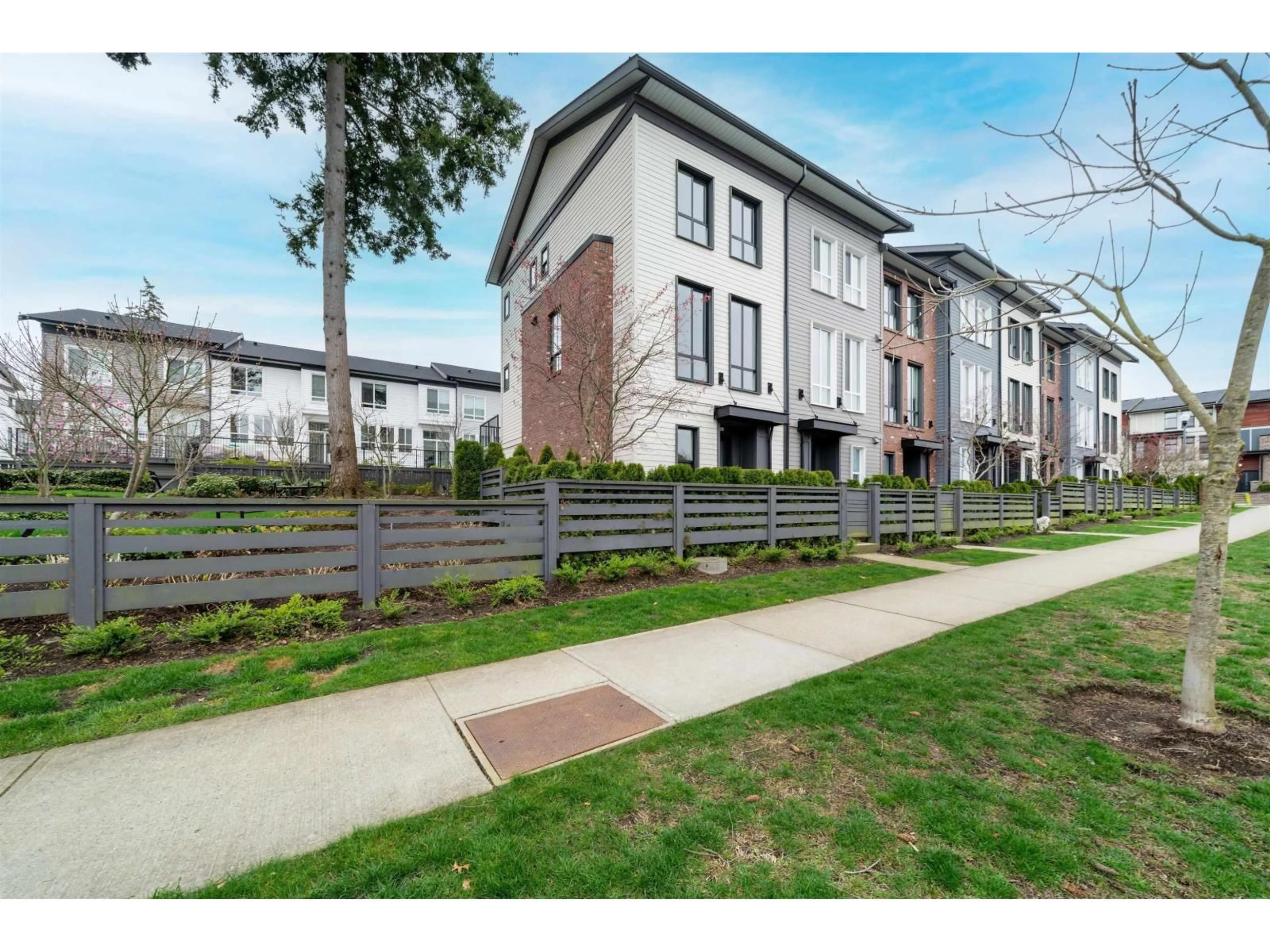A pic from outside/outdoor area/front of a property/back of a property/a pic from drone, street for 8 - 15828 27, Surrey British Columbia V3Z0X4