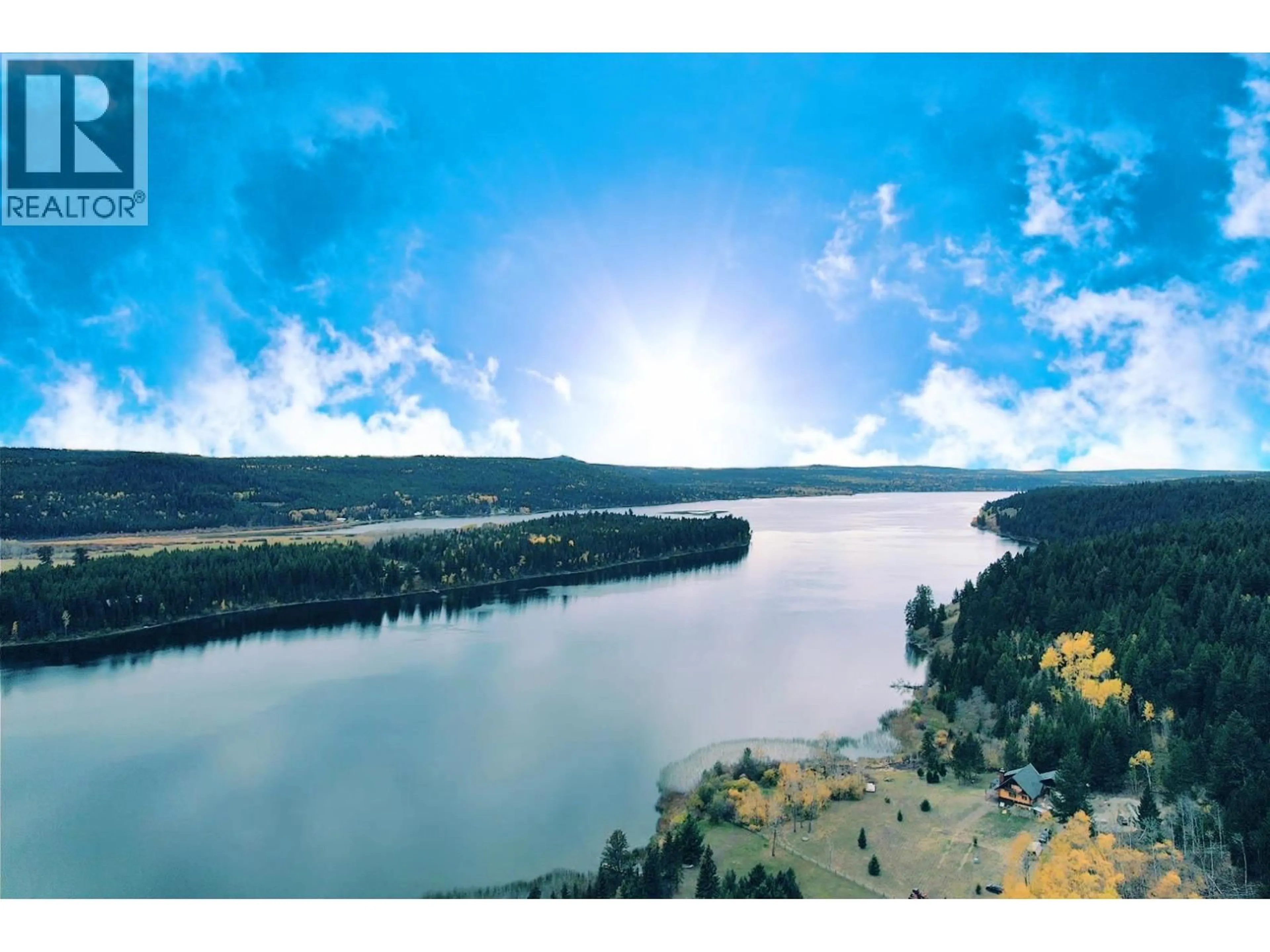 A pic from outside/outdoor area/front of a property/back of a property/a pic from drone, water/lake/river/ocean view for 6656 NORTH SHORE HORSE LAKE ROAD, Horse Lake British Columbia V0K2E3