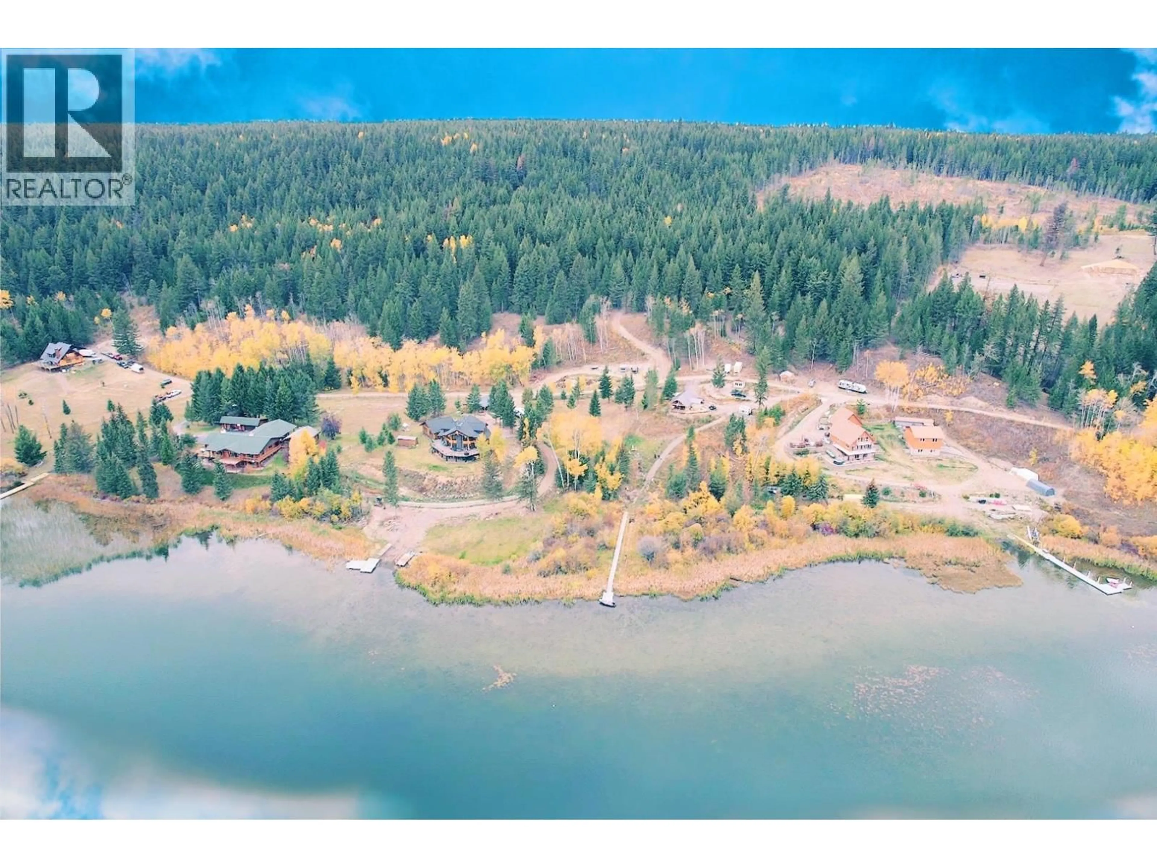 A pic from outside/outdoor area/front of a property/back of a property/a pic from drone, water/lake/river/ocean view for 6656 NORTH SHORE HORSE LAKE ROAD, Horse Lake British Columbia V0K2E3