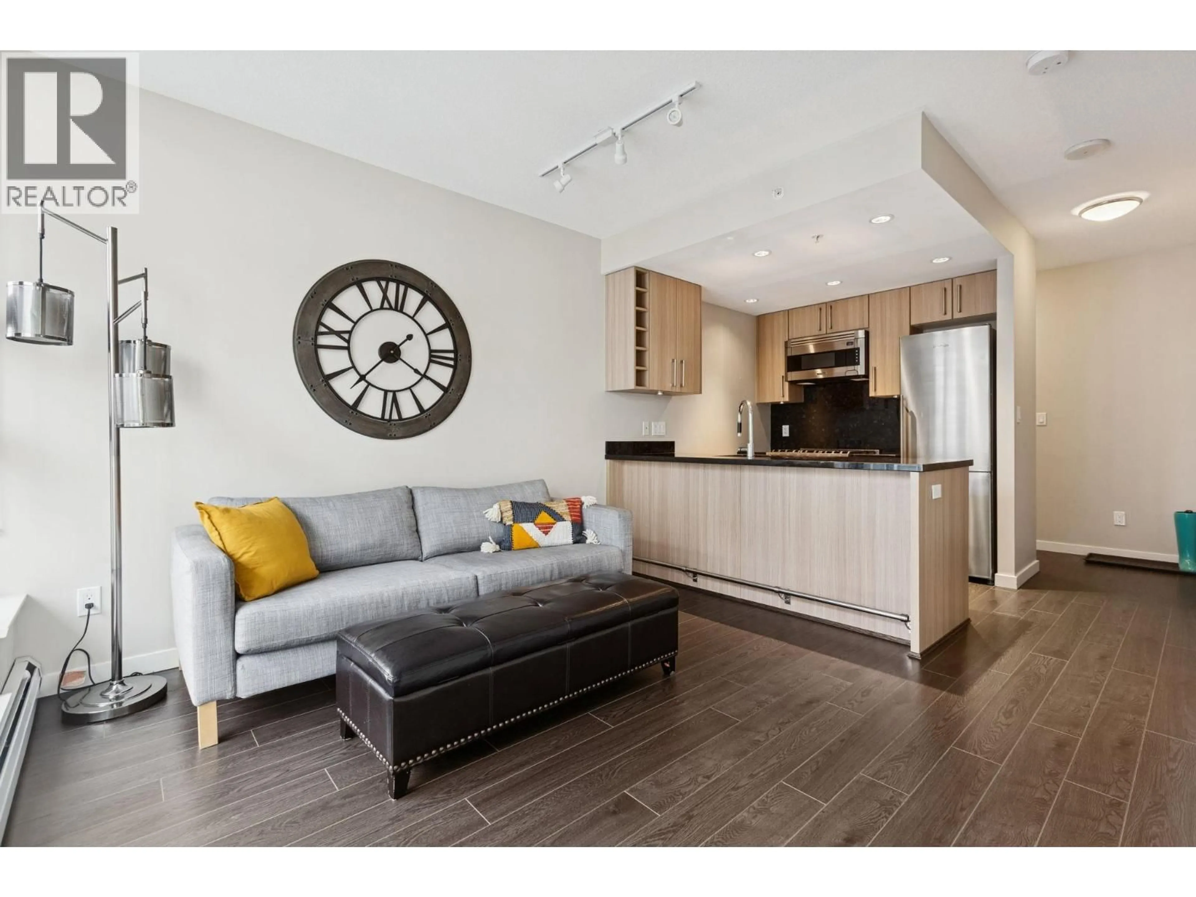 Living room with furniture, wood/laminate floor for 1001 - 108 1ST AVENUE, Vancouver British Columbia V5Y0H4