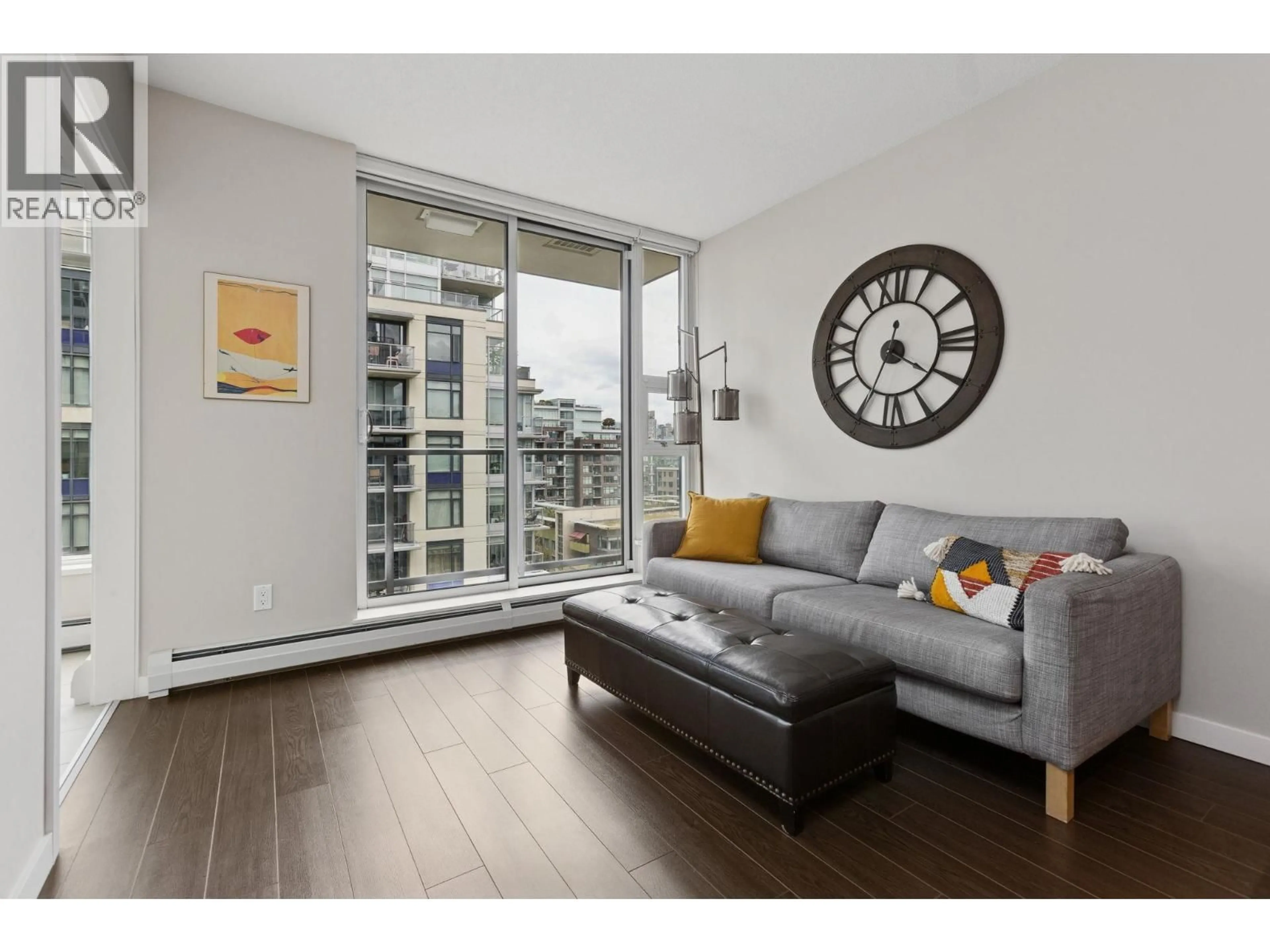 Living room with furniture, wood/laminate floor for 1001 - 108 1ST AVENUE, Vancouver British Columbia V5Y0H4