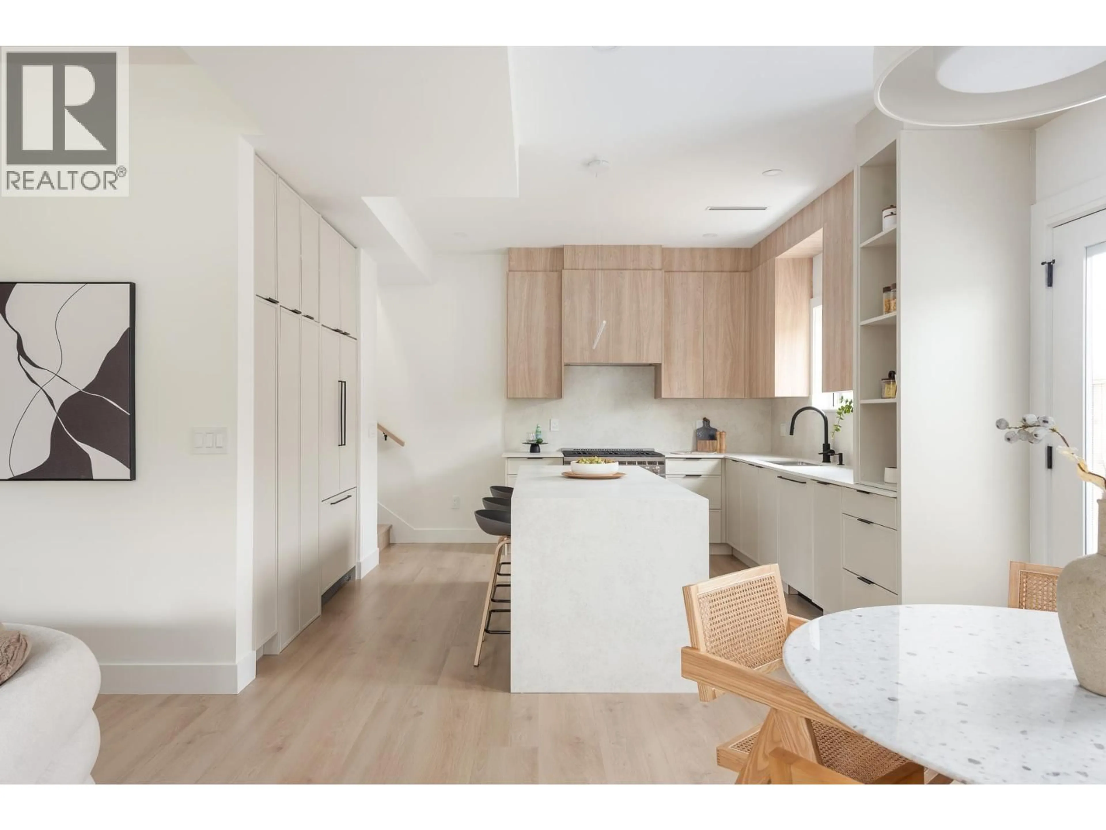 Open concept kitchen, wood/laminate floor for 102 - 1132 MADORE AVENUE, Coquitlam British Columbia V3K3B9