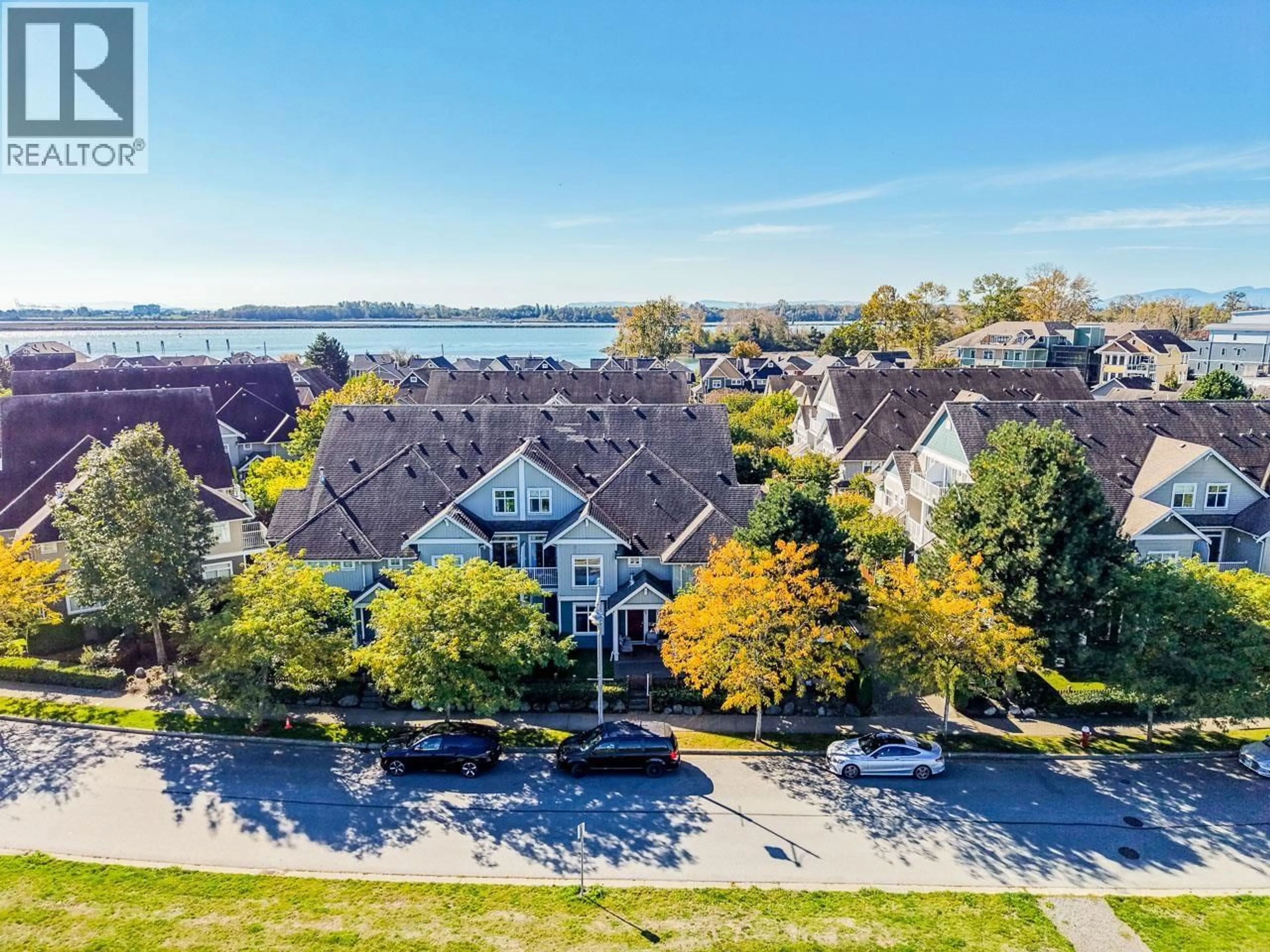 A pic from outside/outdoor area/front of a property/back of a property/a pic from drone, water/lake/river/ocean view for 45 - 6300 LONDON ROAD, Richmond British Columbia V7E6V6