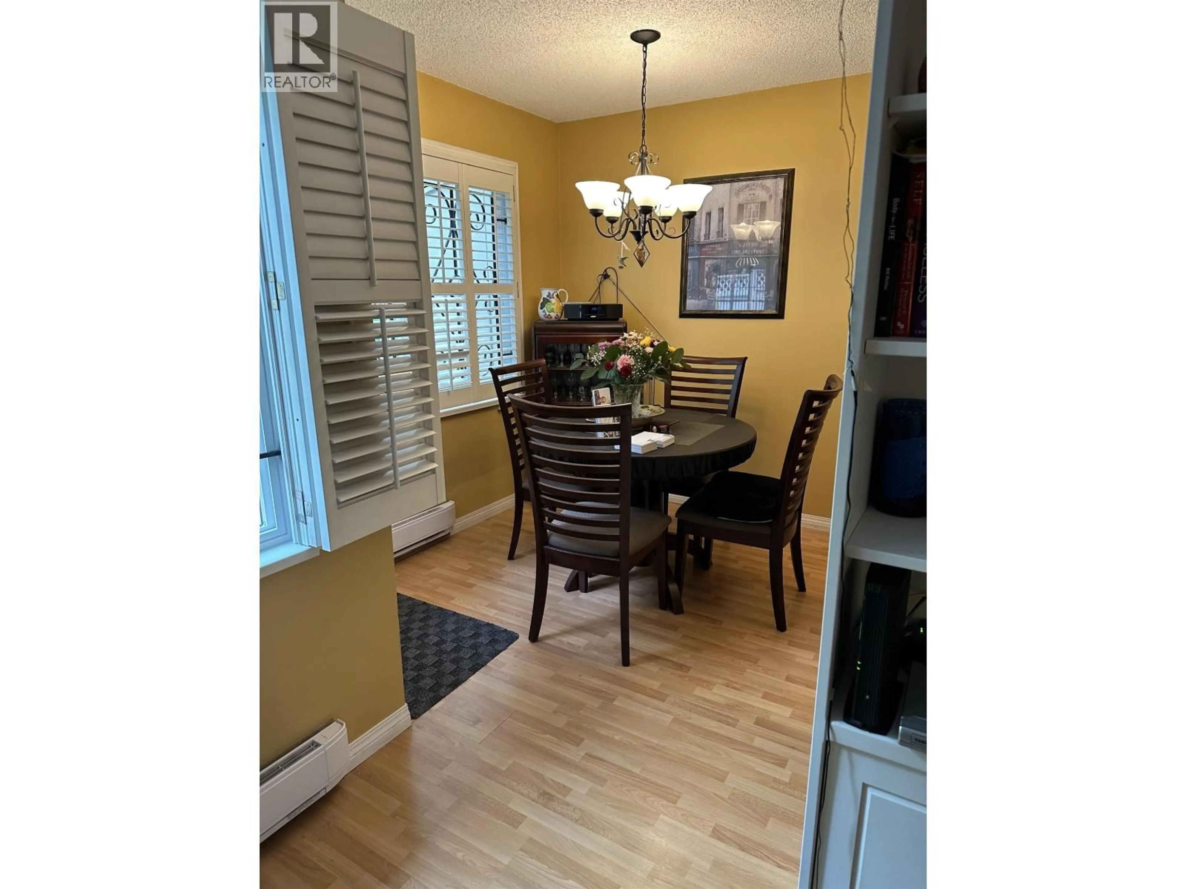 Dining room, wood/laminate floor for 3444 LANGFORD AVENUE, Vancouver British Columbia V5S4B7