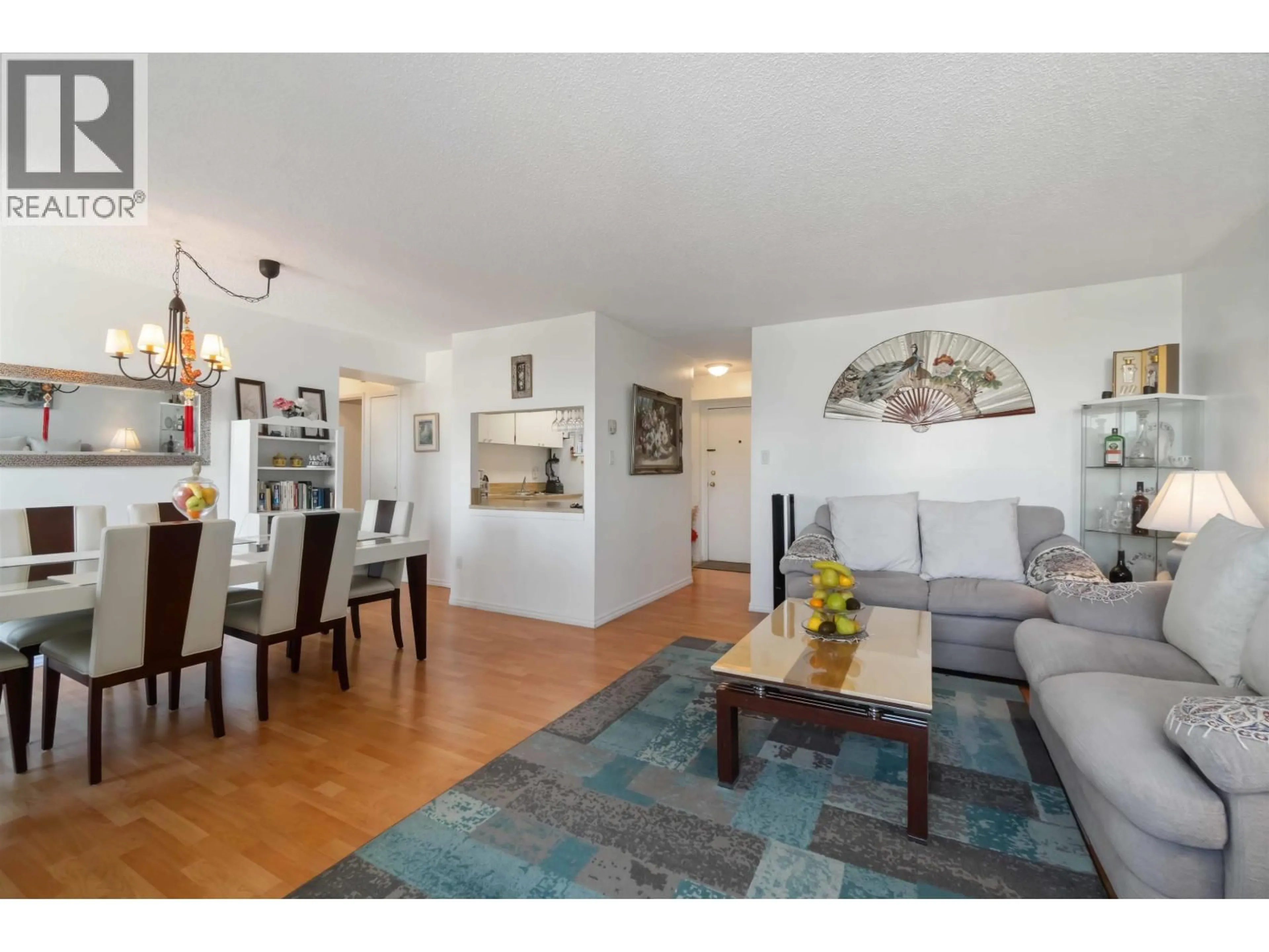 Living room with furniture, wood/laminate floor for 1201 - 3755 BARTLETT COURT, Burnaby British Columbia V3J7G7