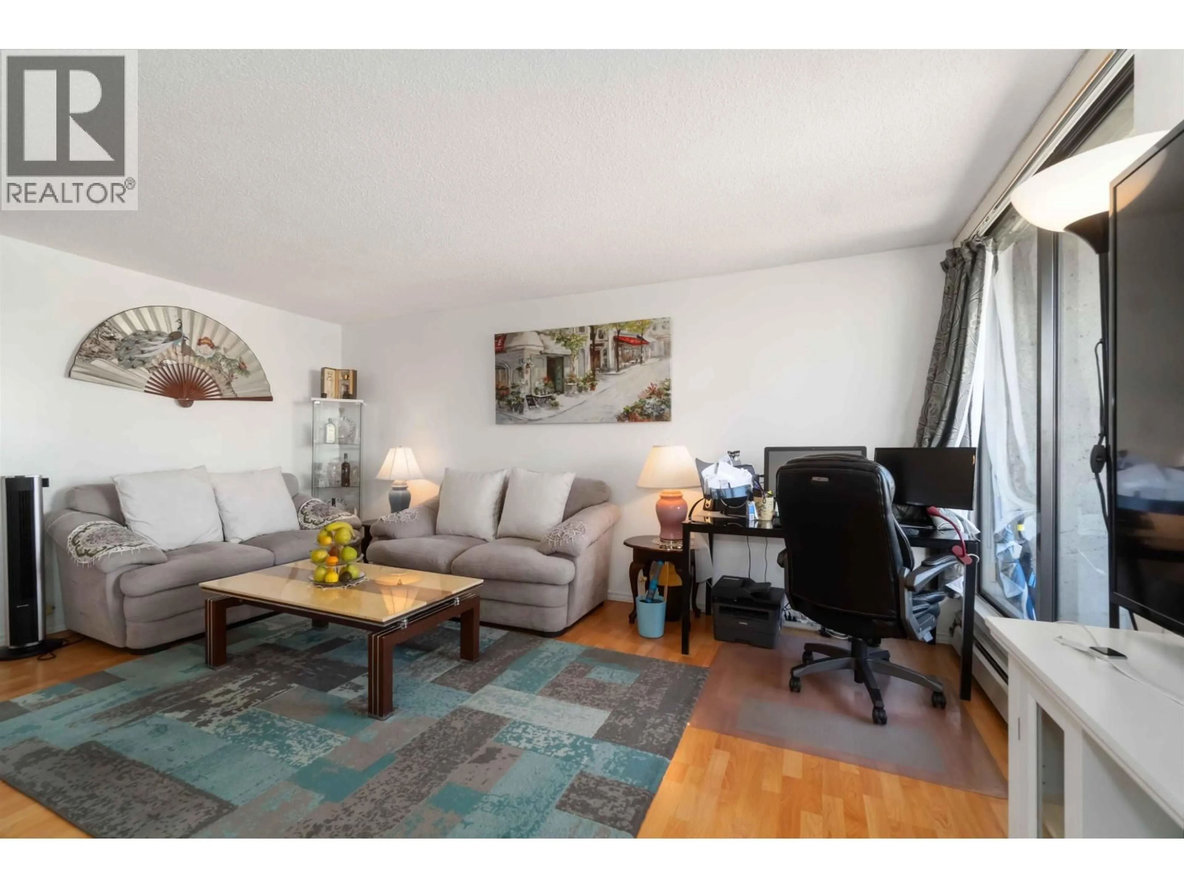 Living room with furniture, wood/laminate floor for 1201 - 3755 BARTLETT COURT, Burnaby British Columbia V3J7G7